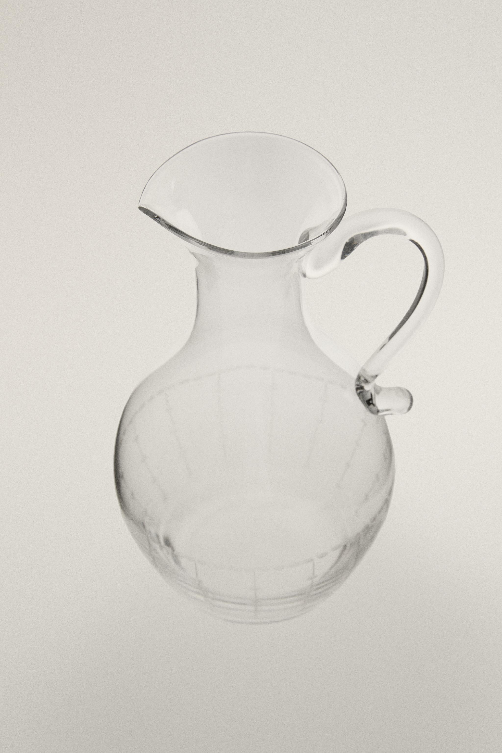 GEOMETRICALLY ENGRAVED GLASS PITCHER