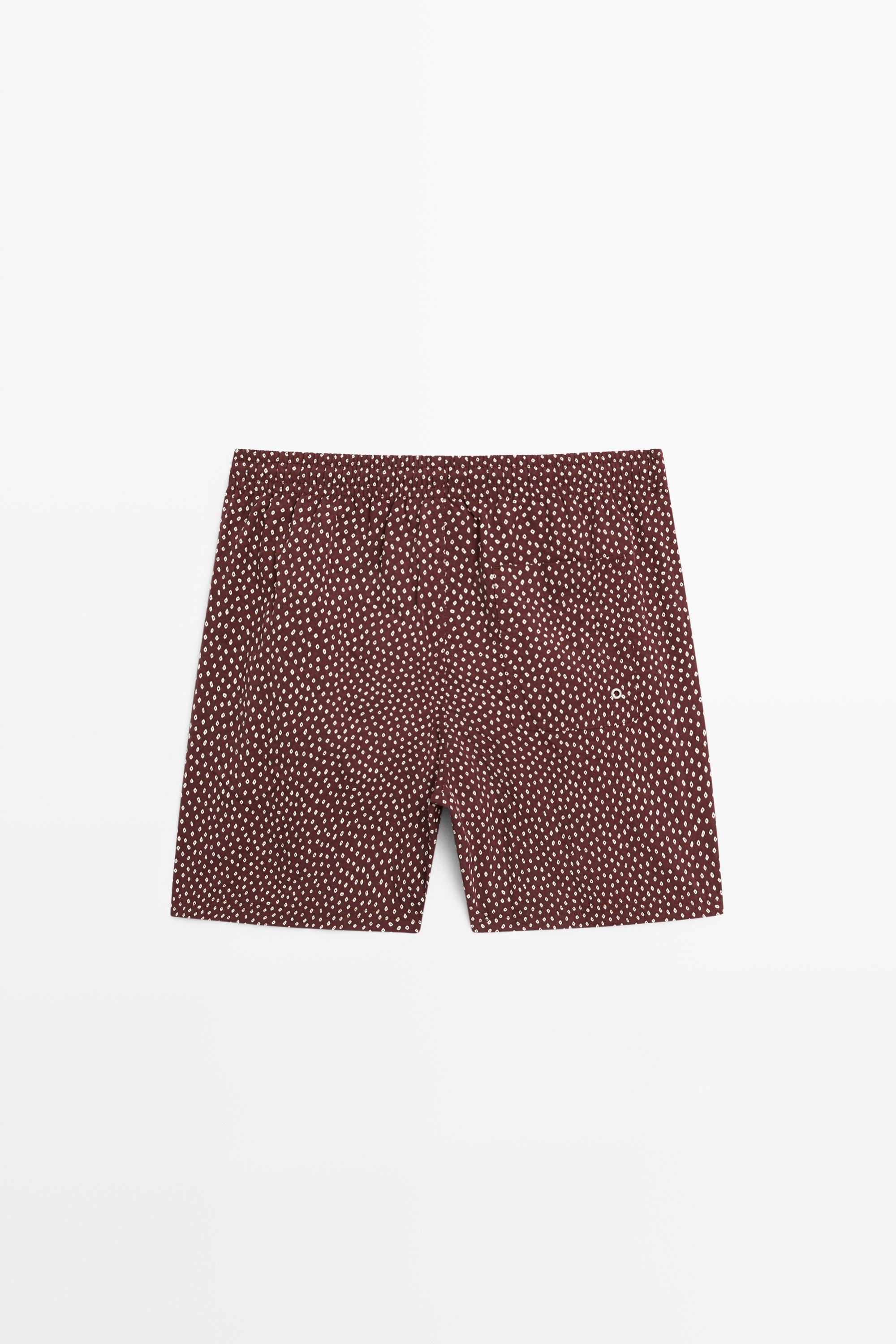 Polka dot print swimming trunks
