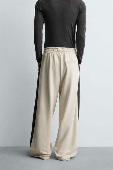 PANTALON DE JOGGING COUPE LARGE AVEC BANDES - Blanc ivoire de Zara - Image 2