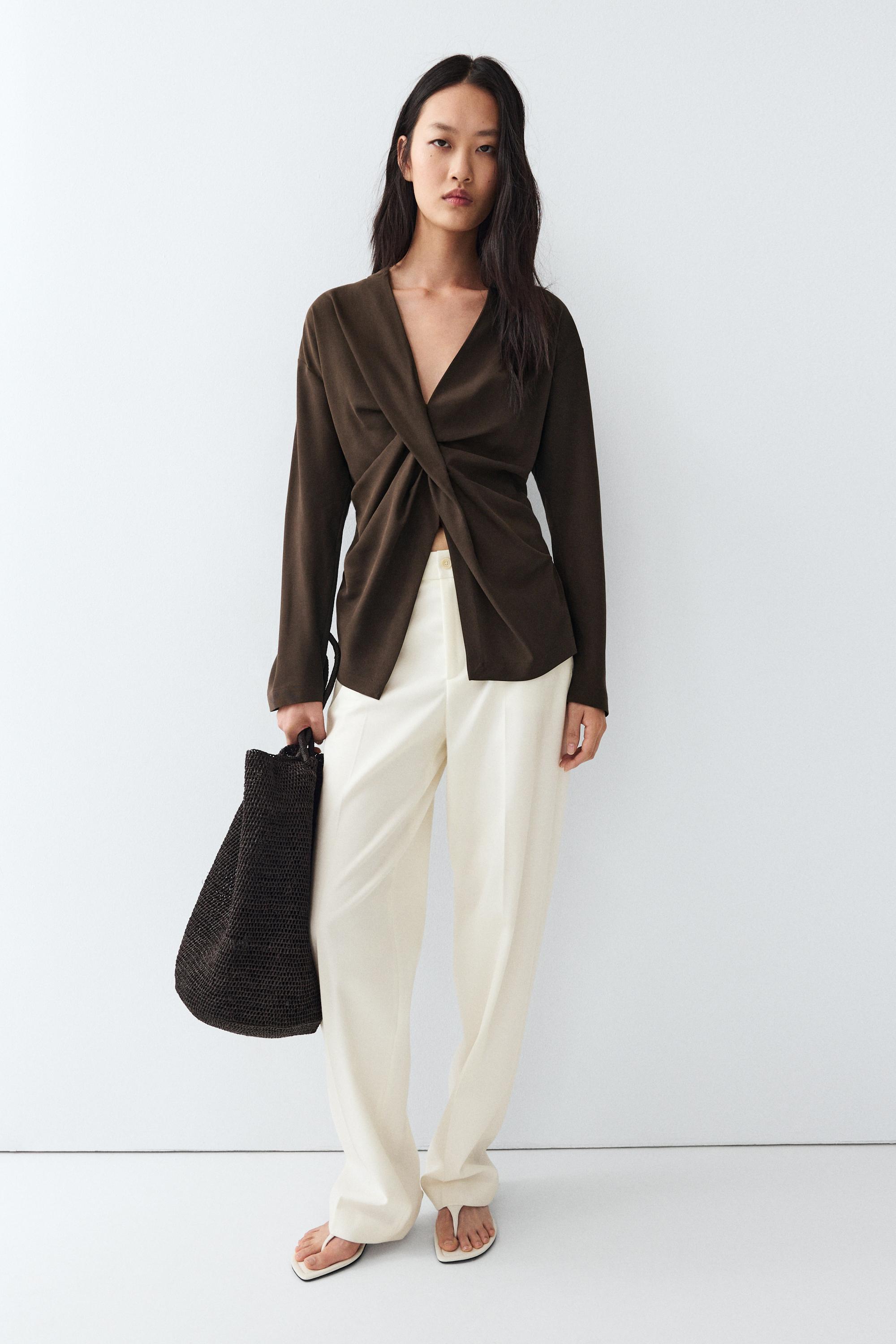 Flowing blouse with draped detail