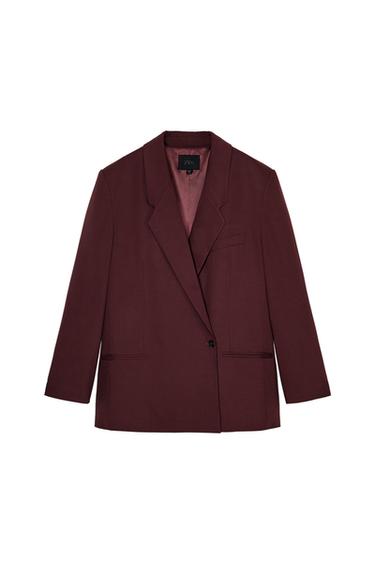Front view of a burgundy blazer with lapel and one button, front pockets.