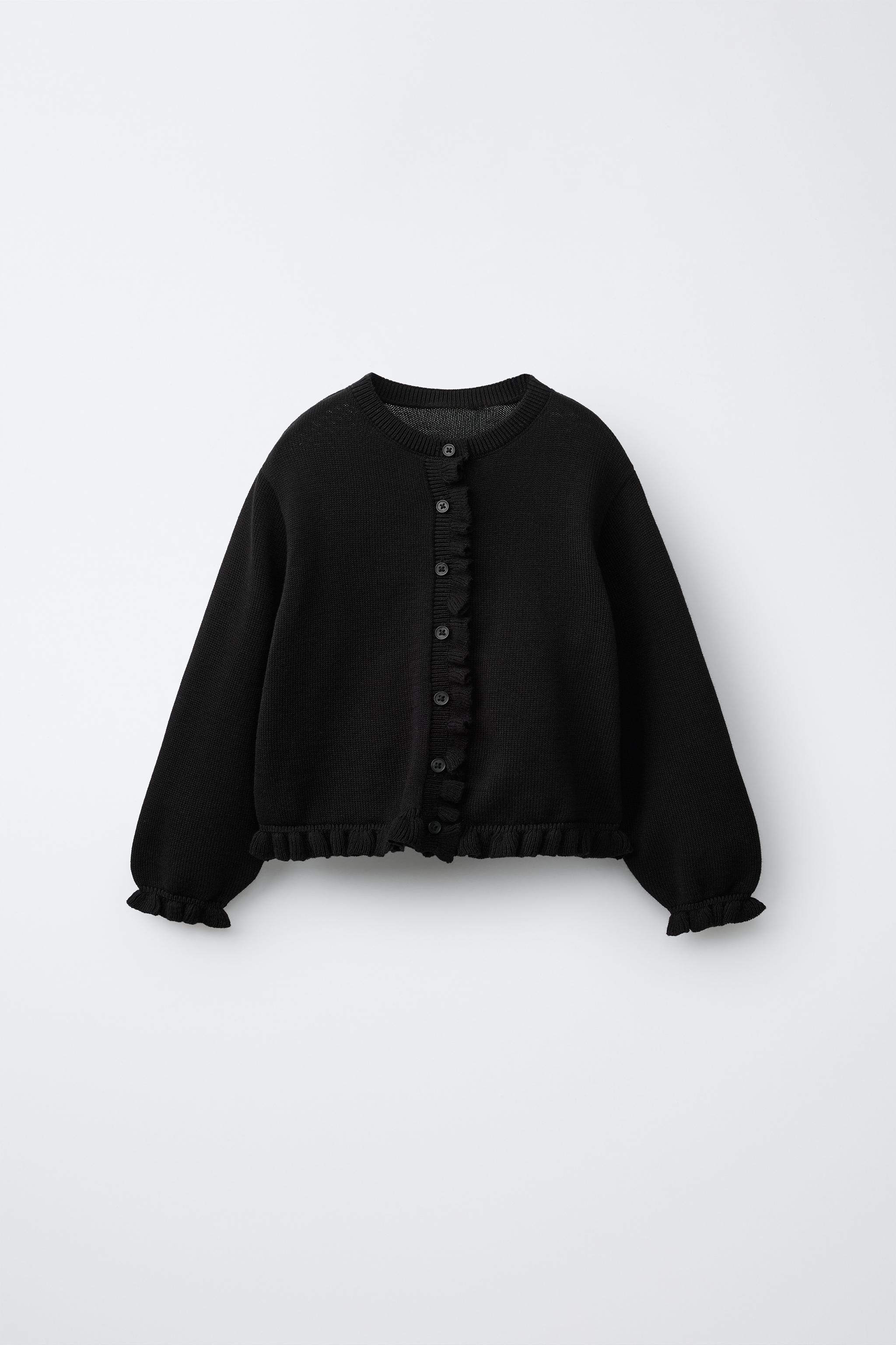 GILET EN MAILLE À PETIT VOLANT