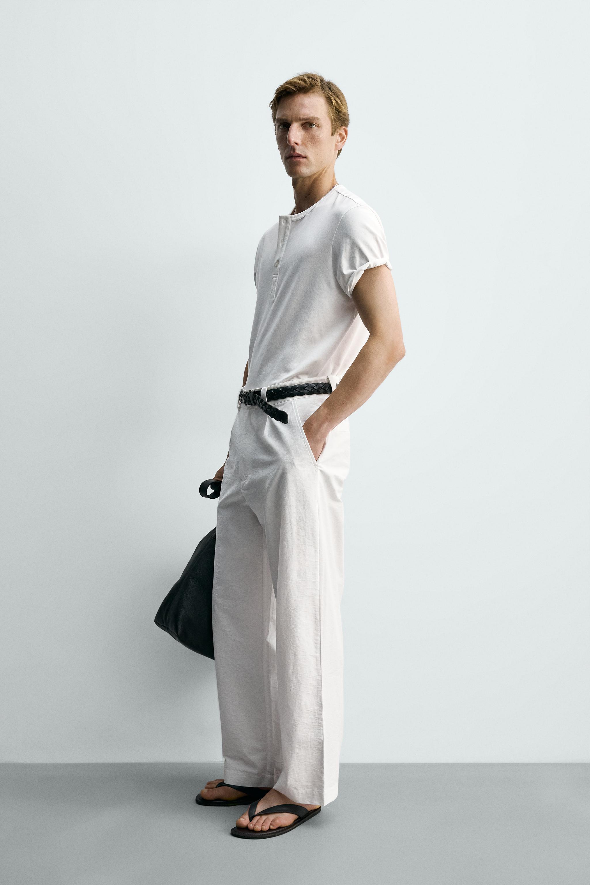 PANTALON COUPE LARGE À PLIS