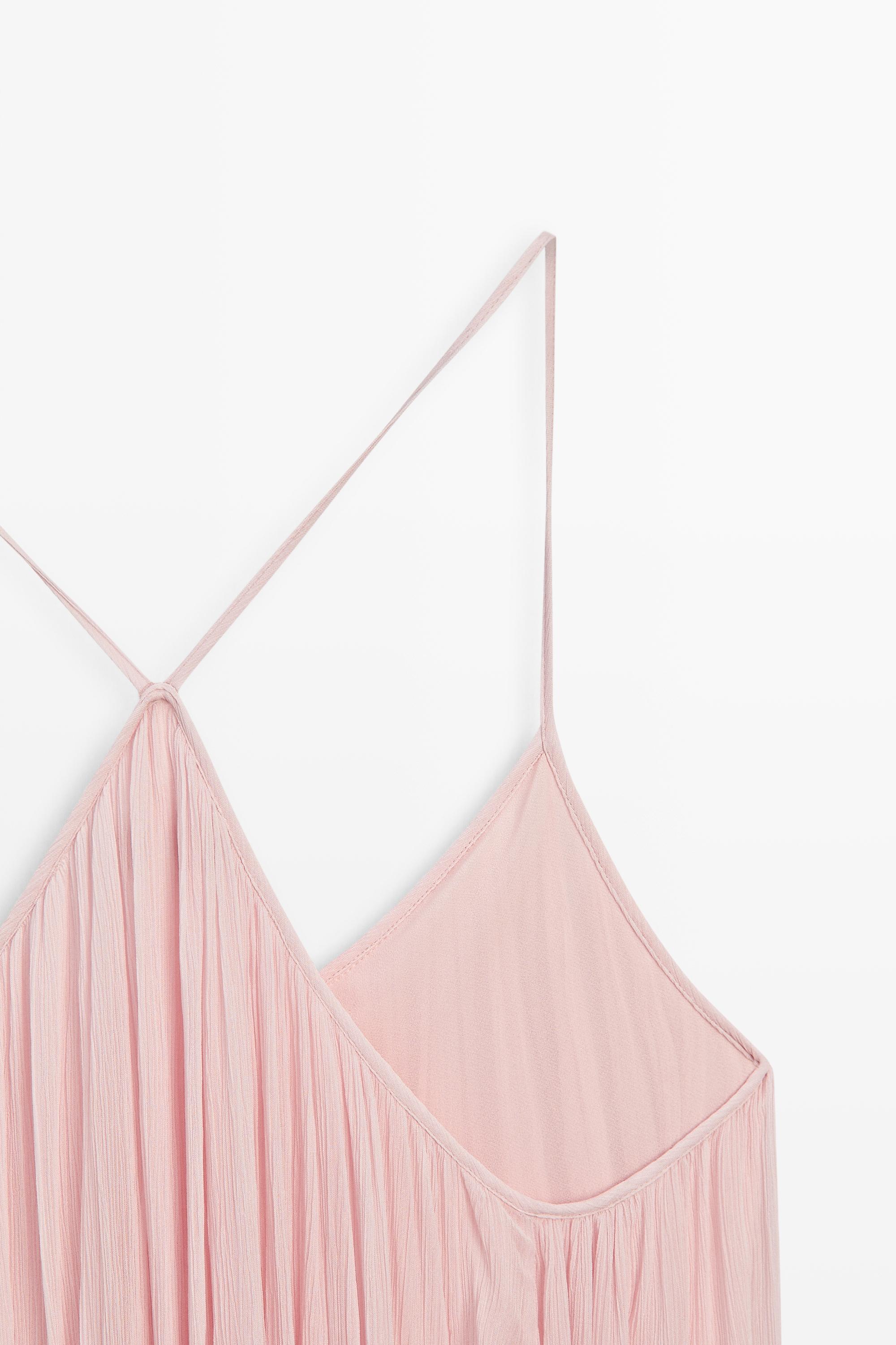Flowing pleated spaghetti strap dress