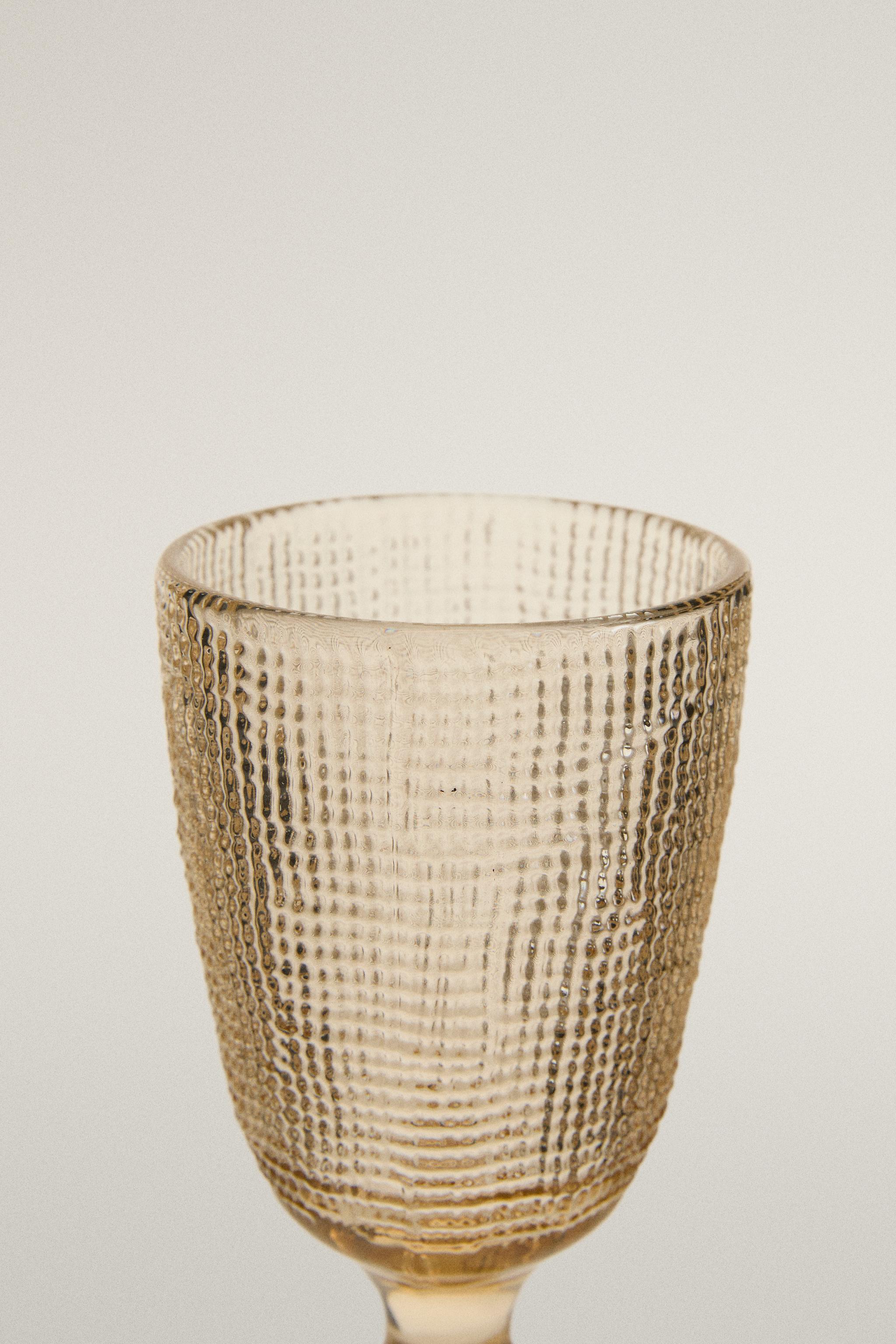 RAISED DESIGN GLASS
