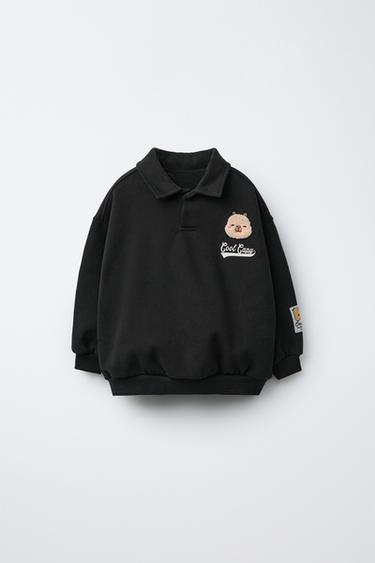 POLO ESTAMPADO PARCHE CAPIBARA CAPYFUN © - Negro de Zara - Imagen 0