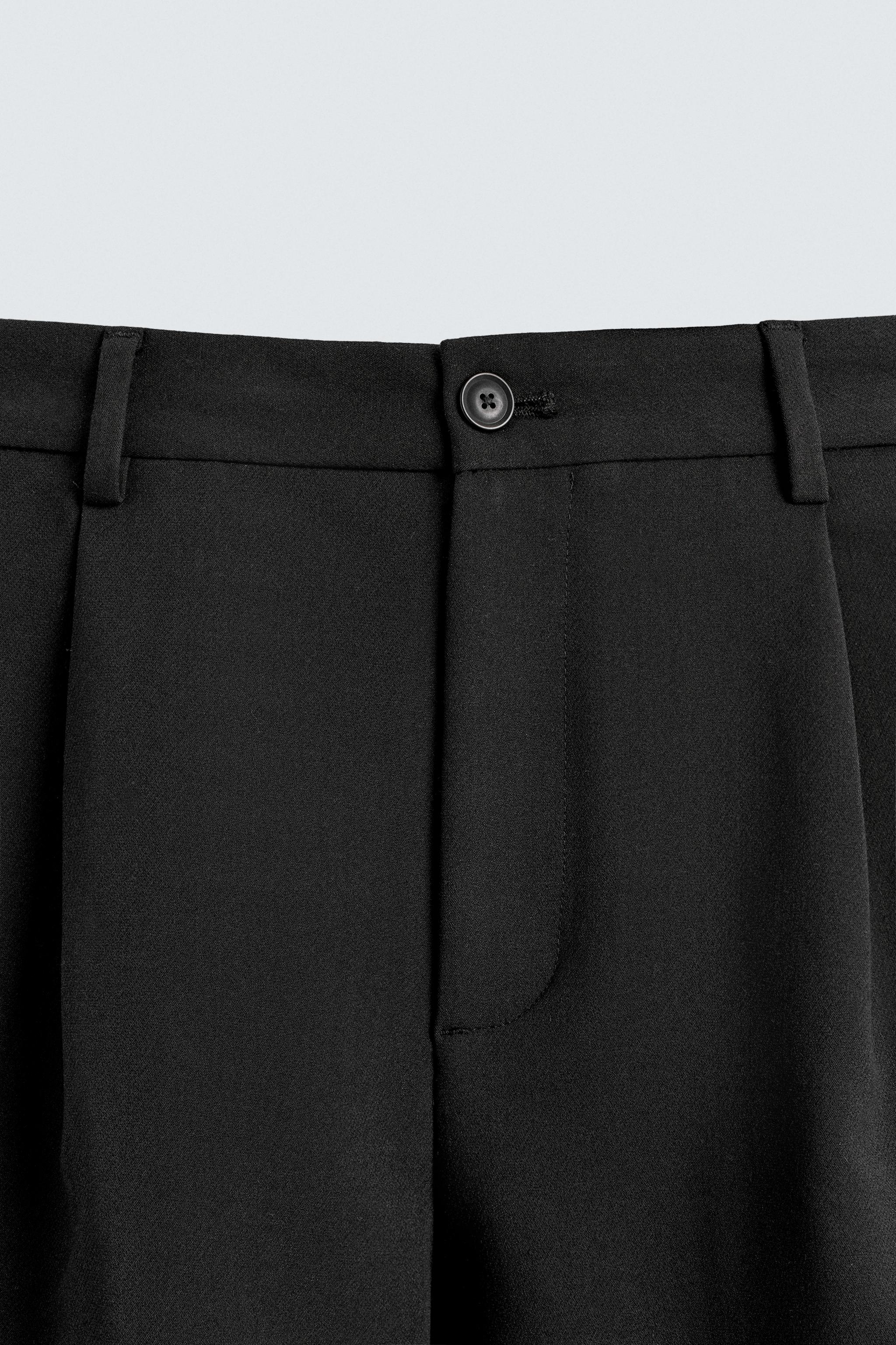 FLOWY PLEATED SHORTS