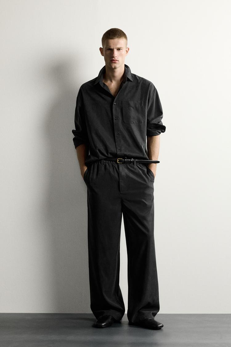 RELAXED FIT FLOWING TROUSERS