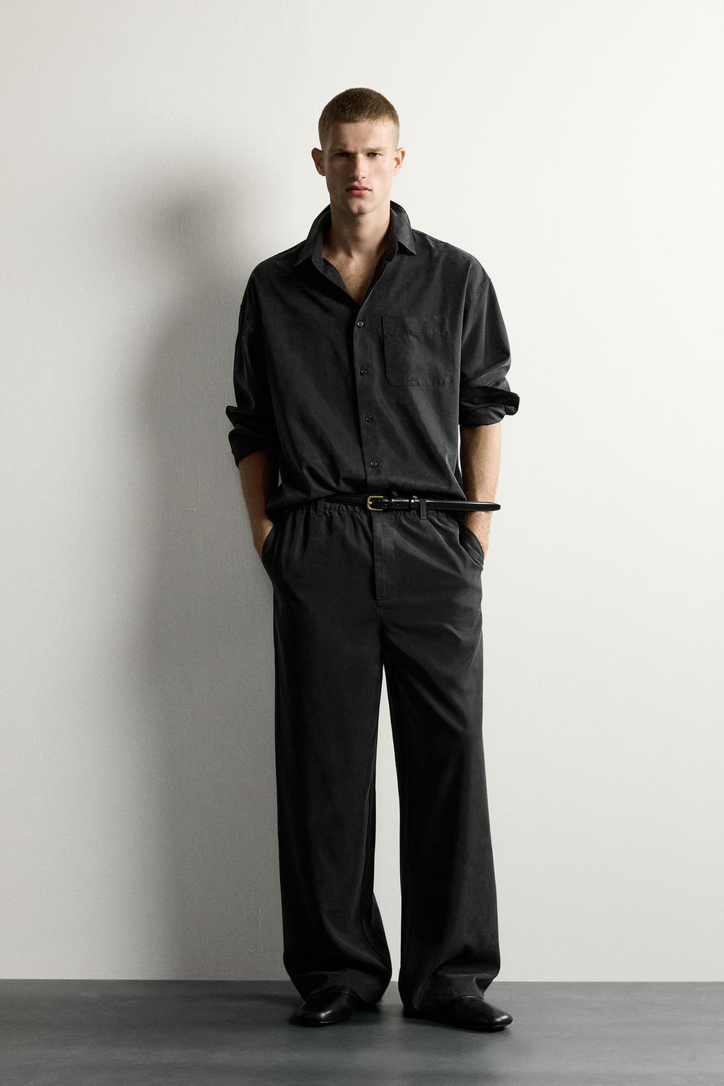 RELAXED FIT FLOWING TROUSERS