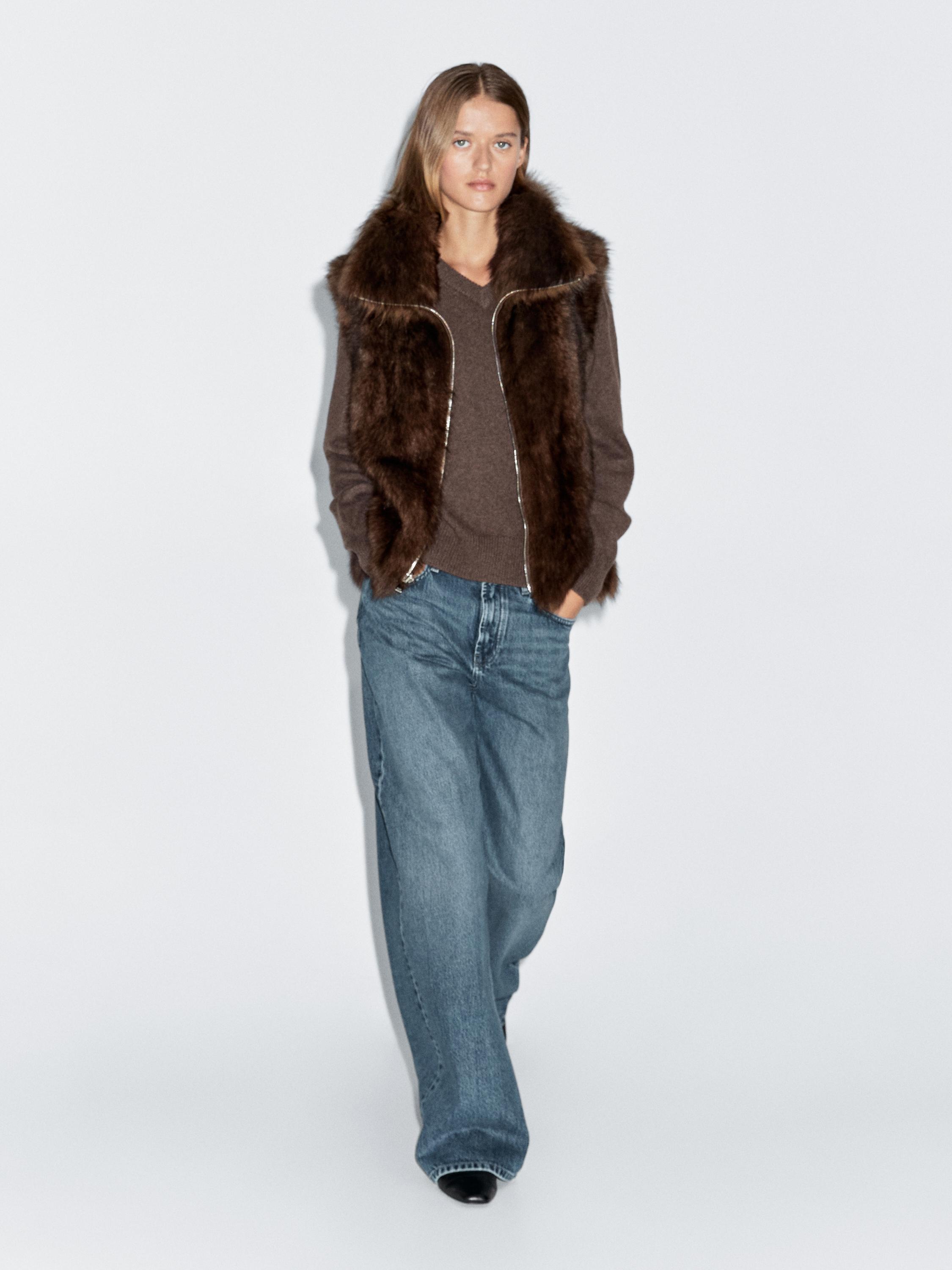 Leather high-neck waistcoat with fur