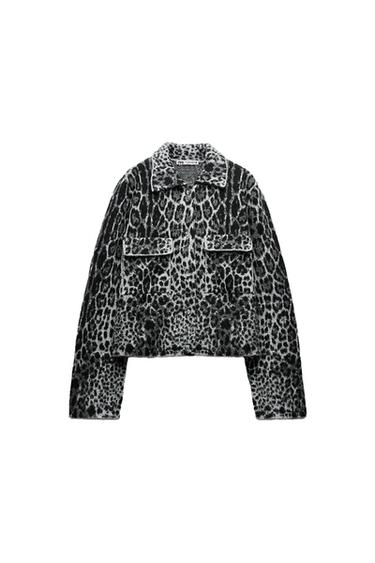 Front view of an animal print jacket with lapels and front pockets.