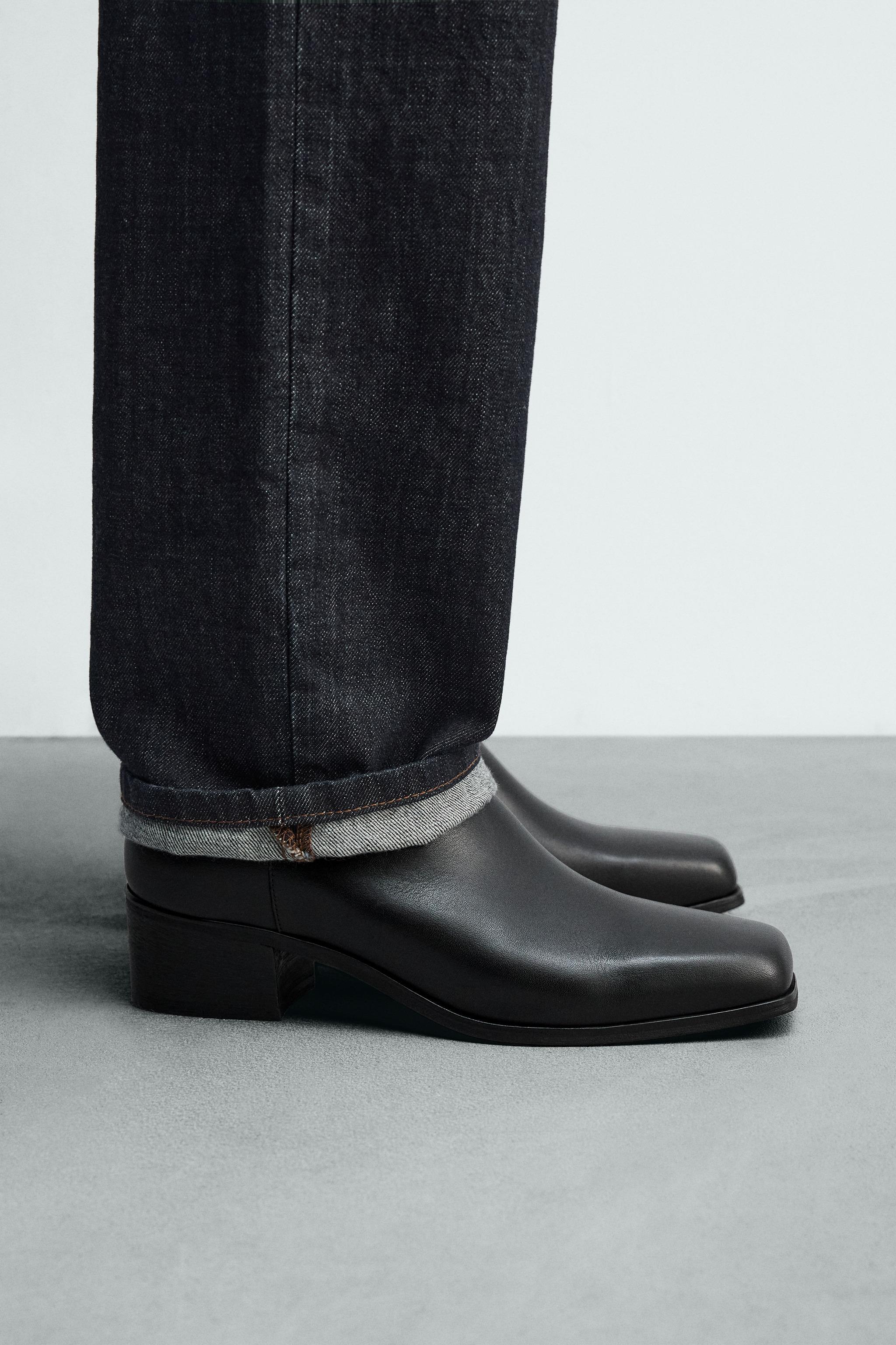 BOTTES EN CUIR À TALONS