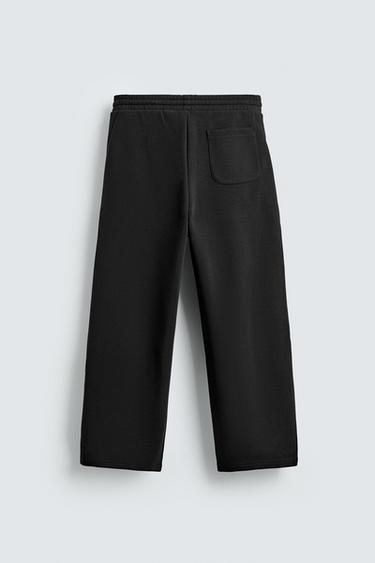 NEOPRENE-EFFECT PLEATED BALLOON FIT TROUSERS - Black by Zara - Image 6