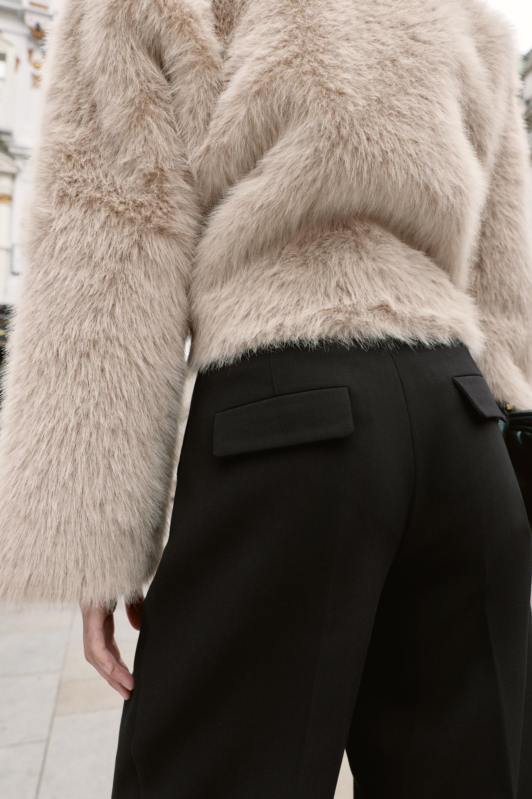 BELTED PLEATED PANTS