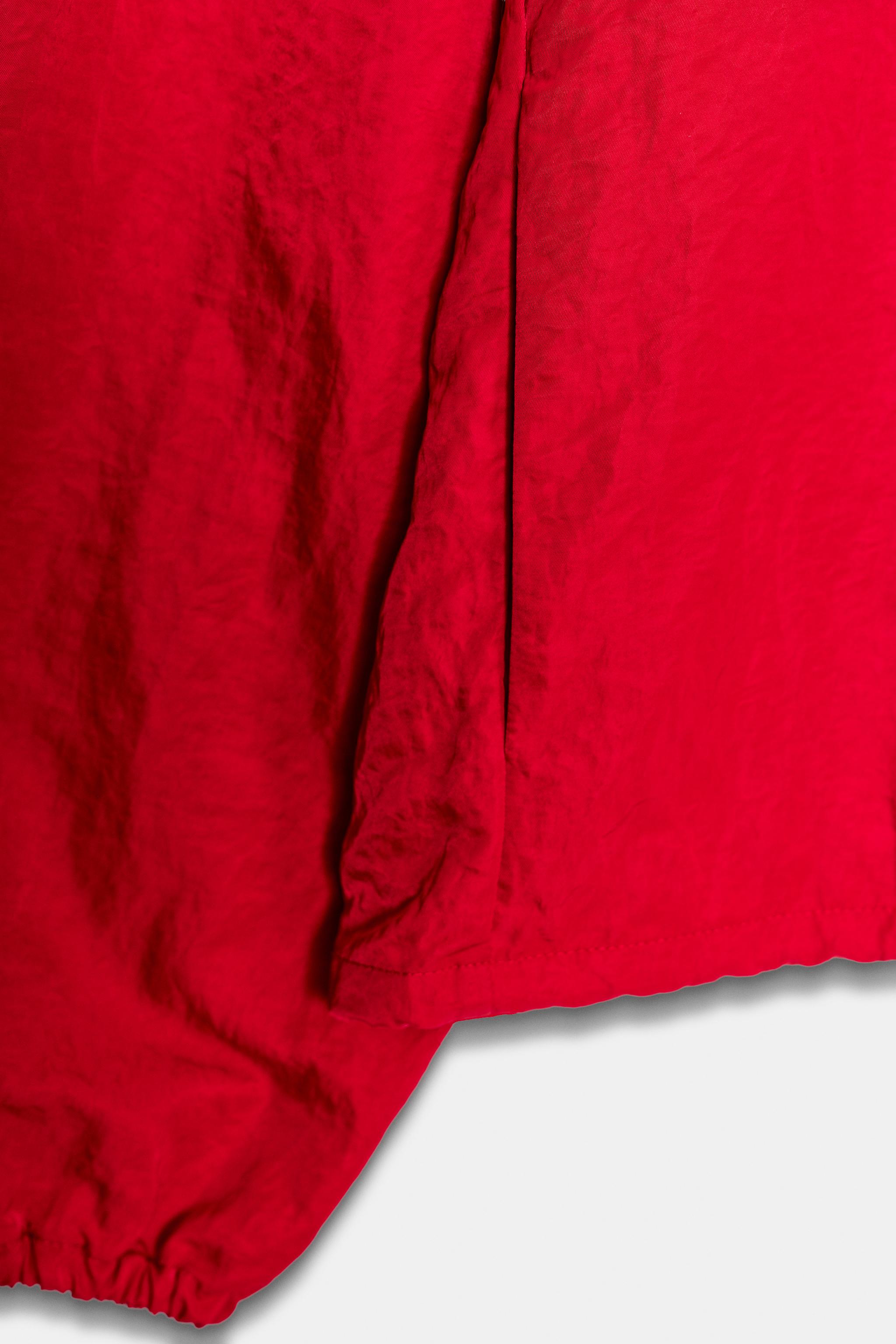VESTE EN TISSU TECHNIQUE À BOUTONS