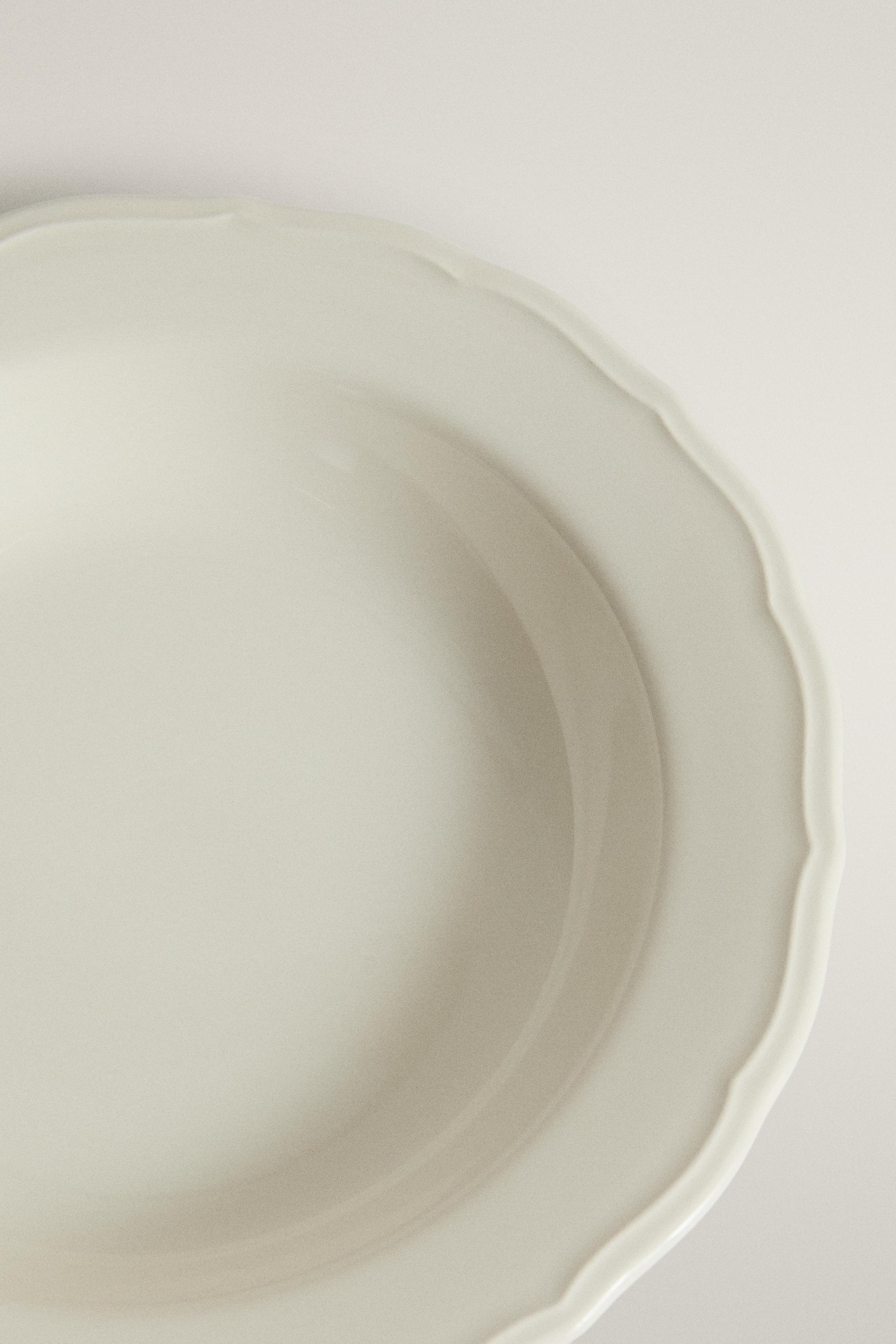EARTHENWARE SOUP PLATE WITH RAISED-DESIGN EDGE