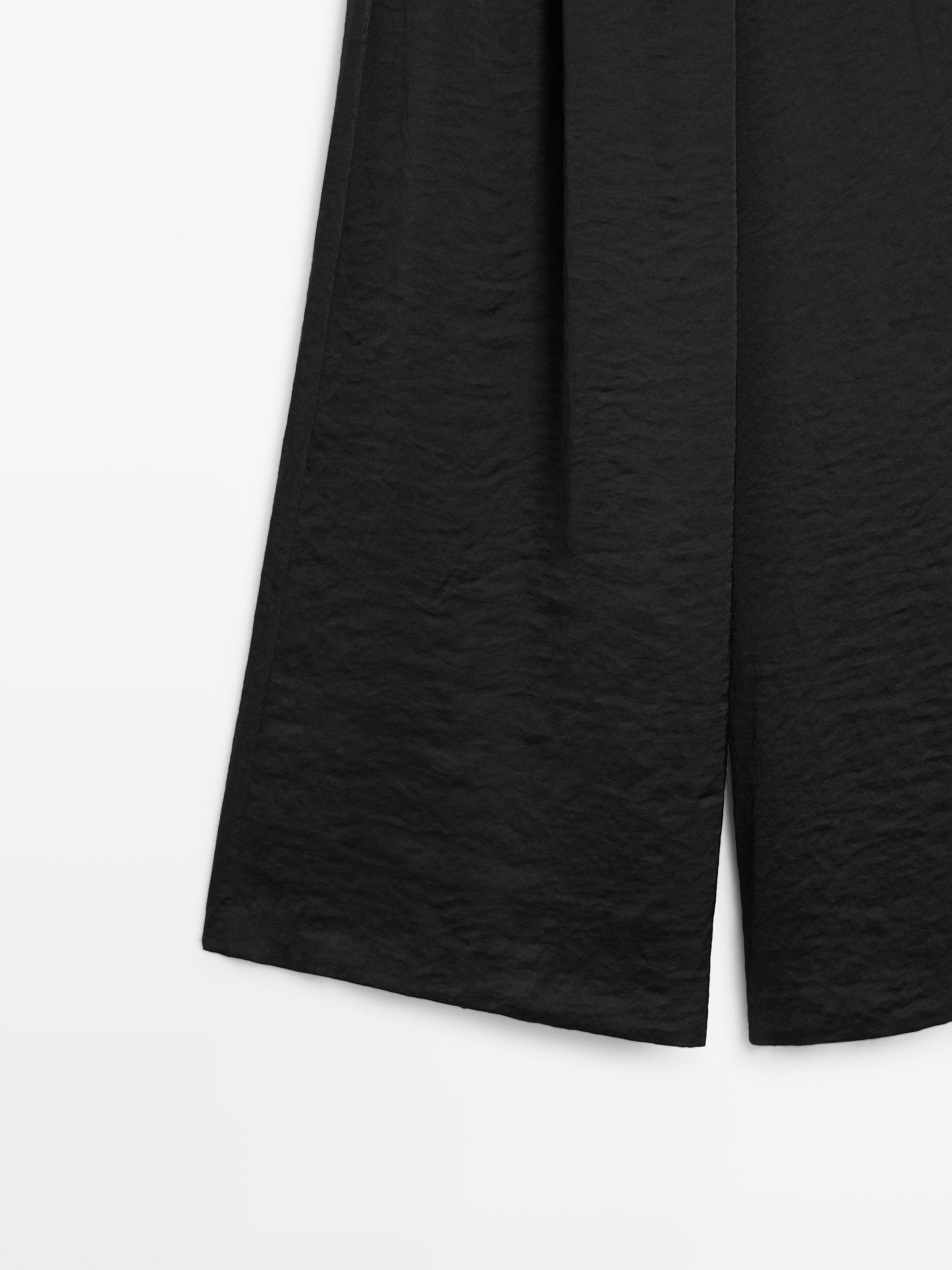 Flowing wide-leg trousers with darts