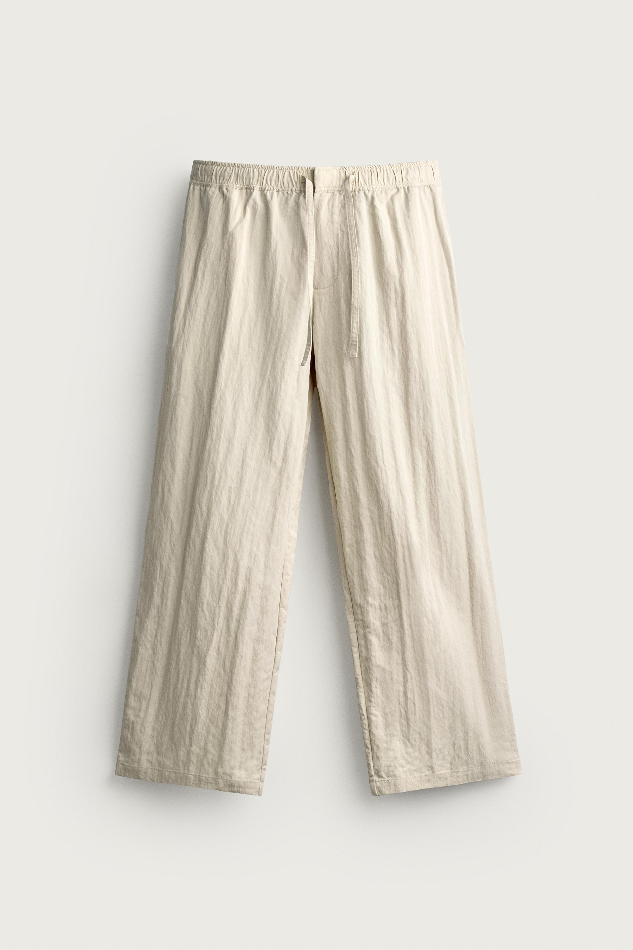 CRINKLED EFFECT TECHNICAL RELAXED FIT PANTS