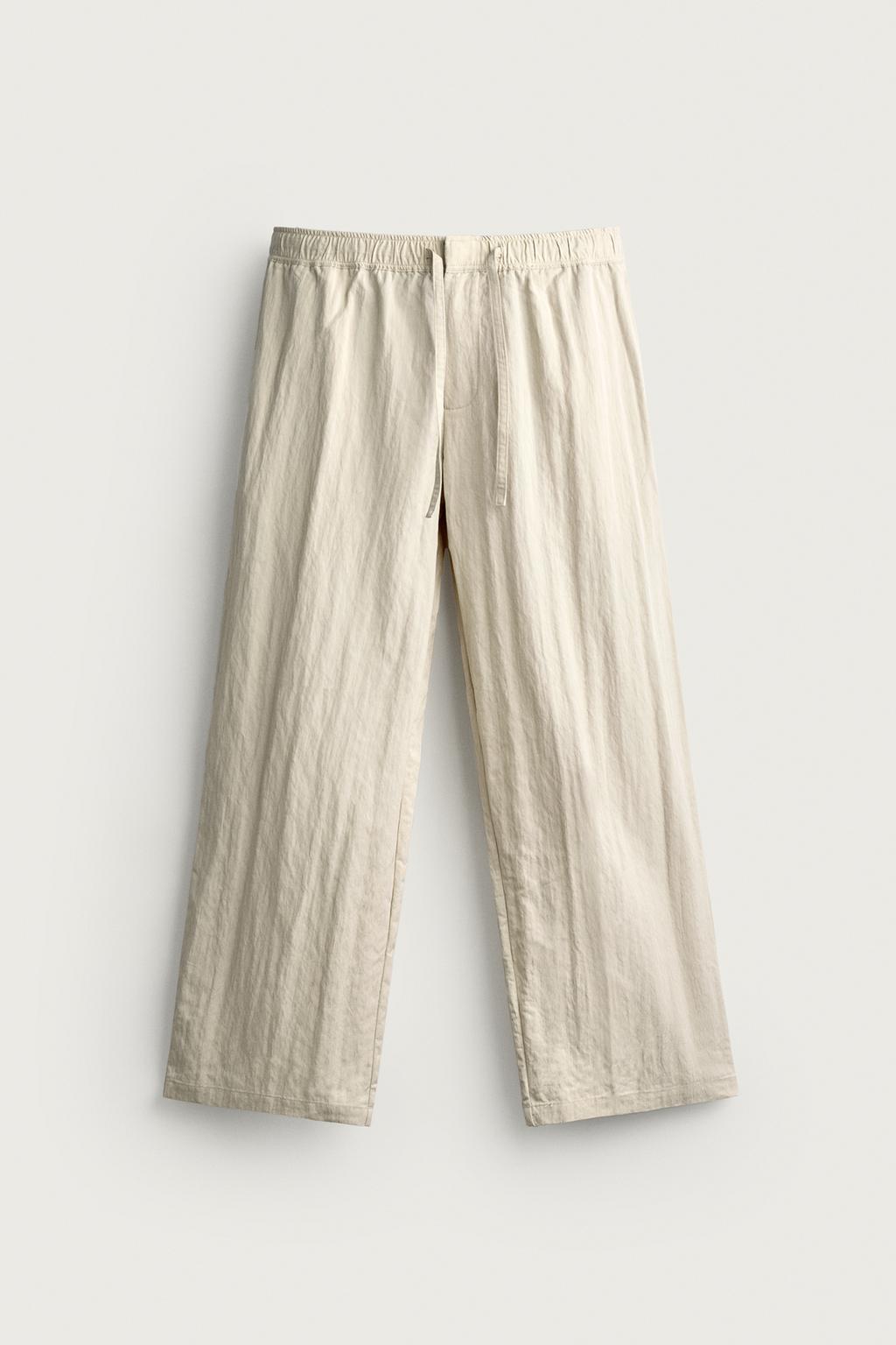 CRINKLED TECHNICAL RELAXED FIT TROUSERS