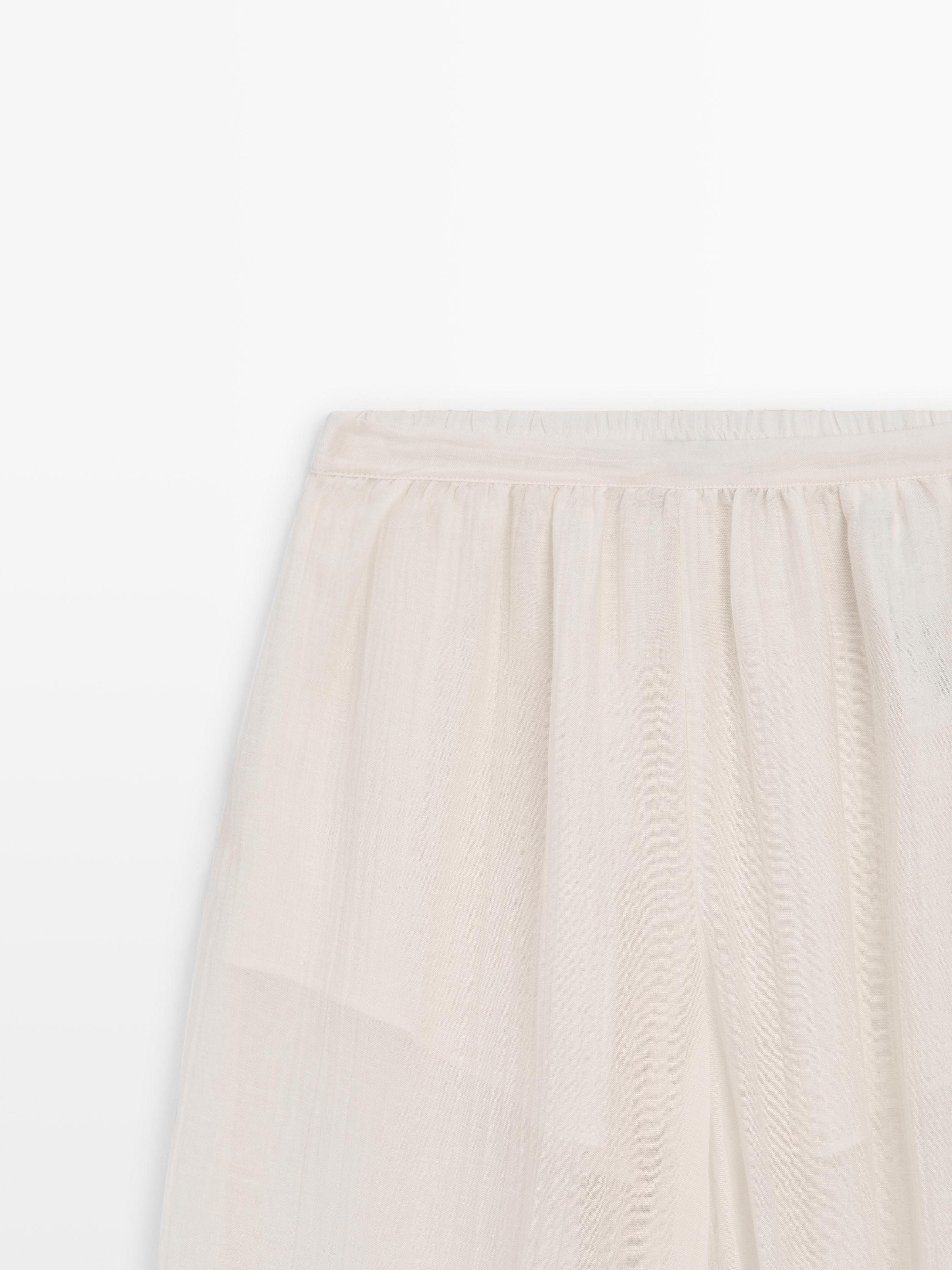 Flowing sarouel trousers with pleated detail