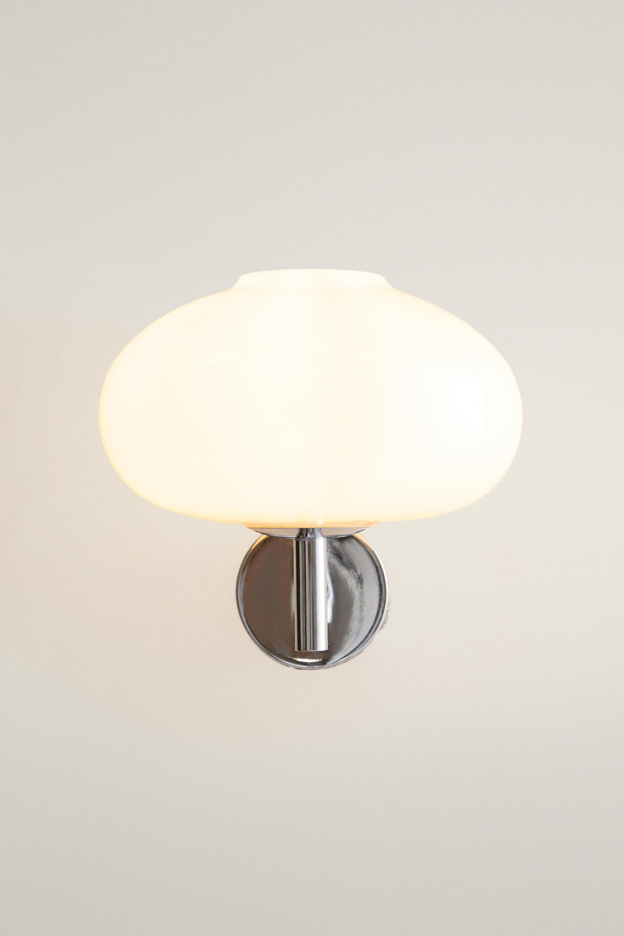 ROUNDED GLASS AND IRON WALL LIGHT