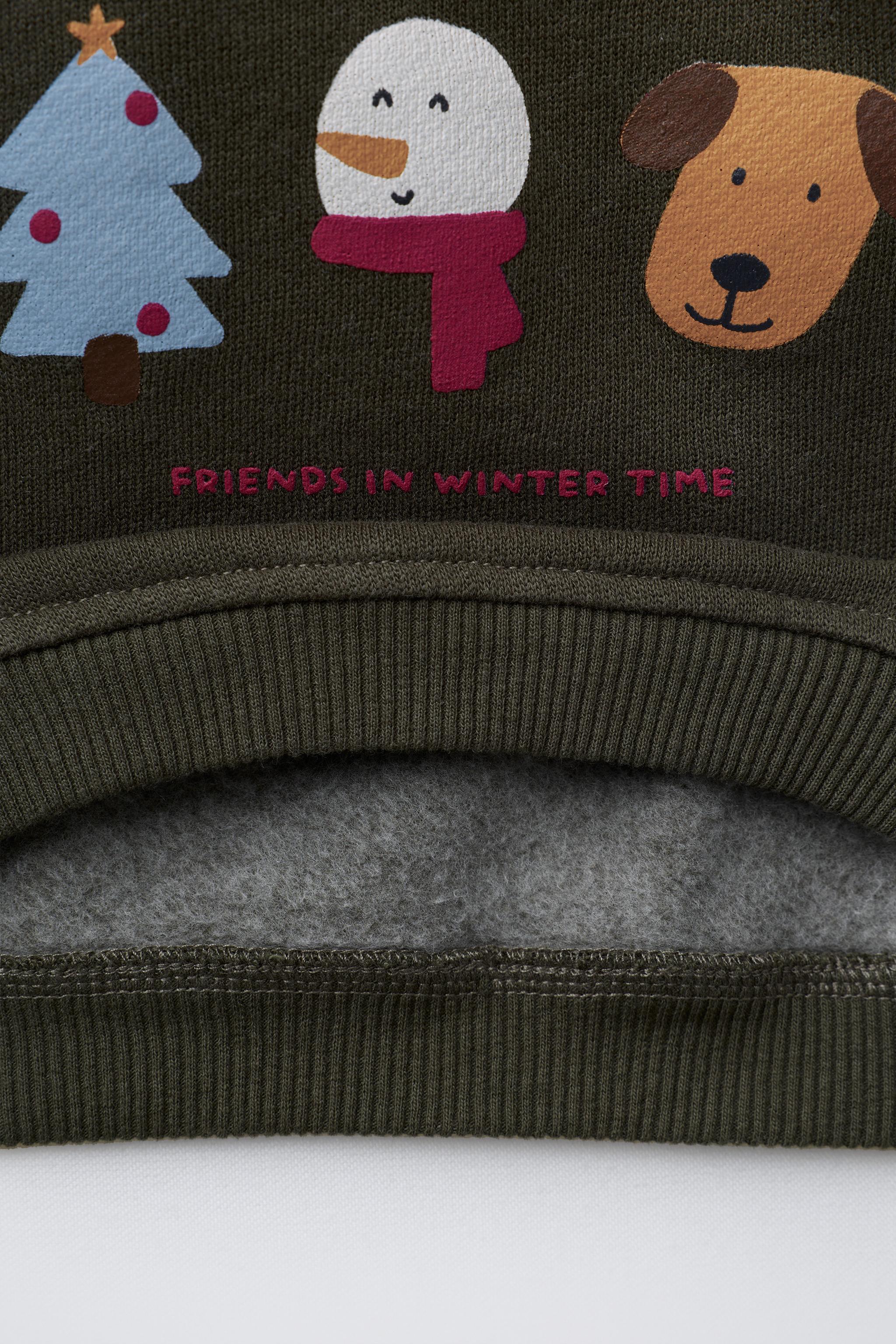 SWEATSHIRT WITH VARIOUS PRINTS