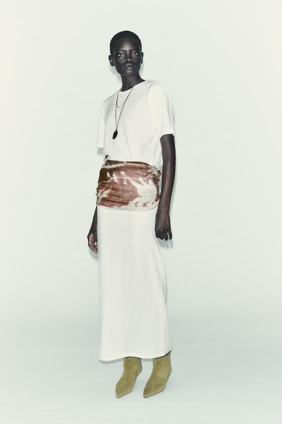 CUT-OUT KNIT MIDI SKIRT