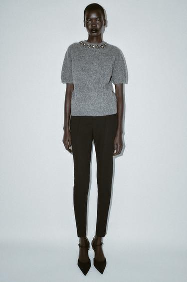 HIGH-WAIST SLIM FIT TROUSERS WITH ZIPPED HEM - Black by Zara