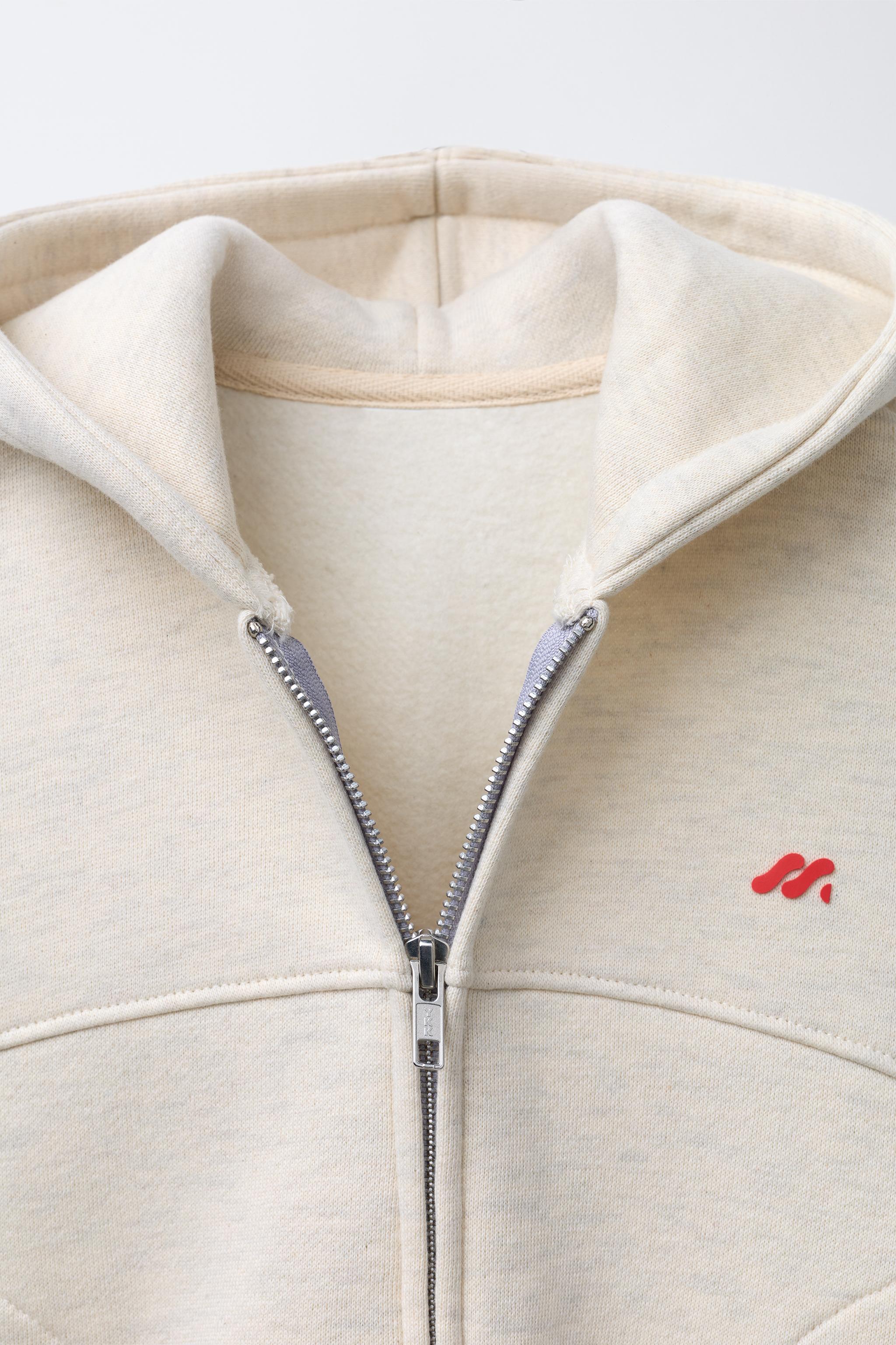 EMBOSSED LOGO ZIP-UP HOODIE