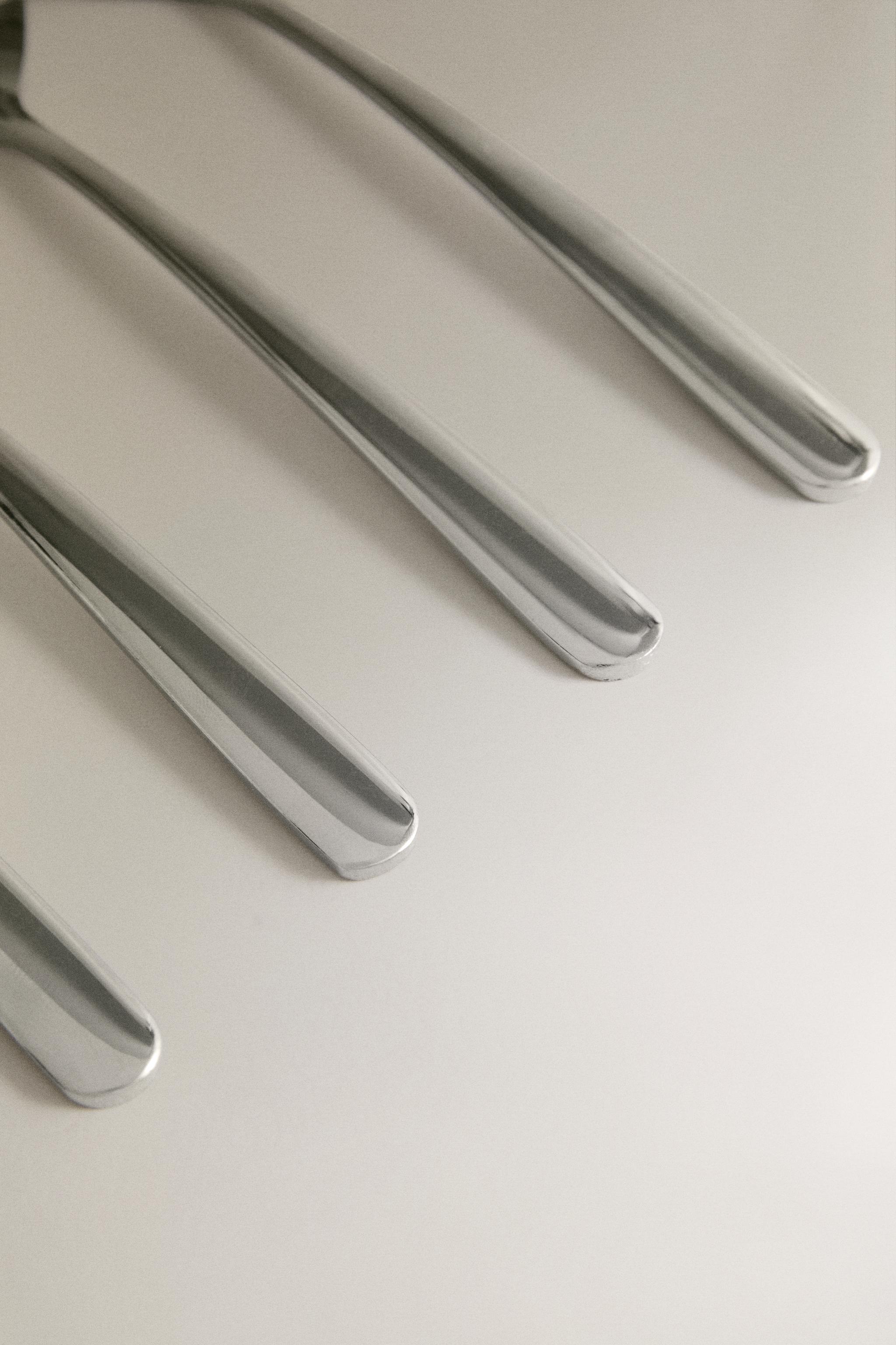 LOT DE 4 PETITES CUILLÈRES COQUILLAGE EN ACIER