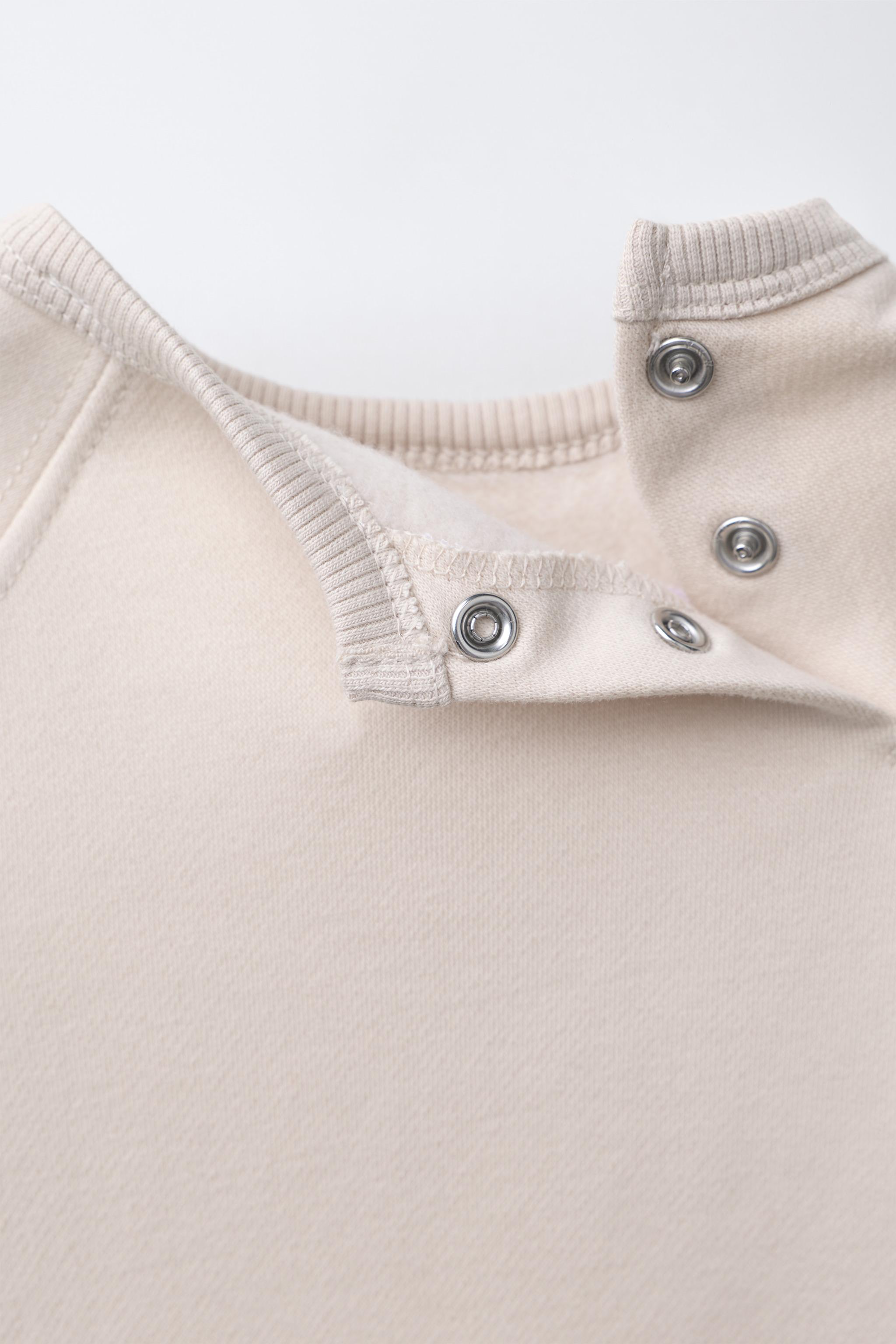 COMBINAISON EN MOLLETON BRODÉ OURS