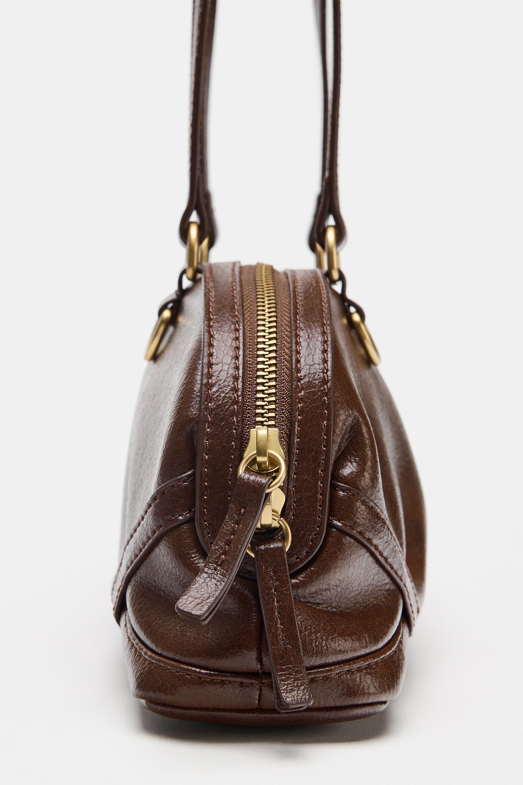 RING-DETAIL SHOULDER BAG