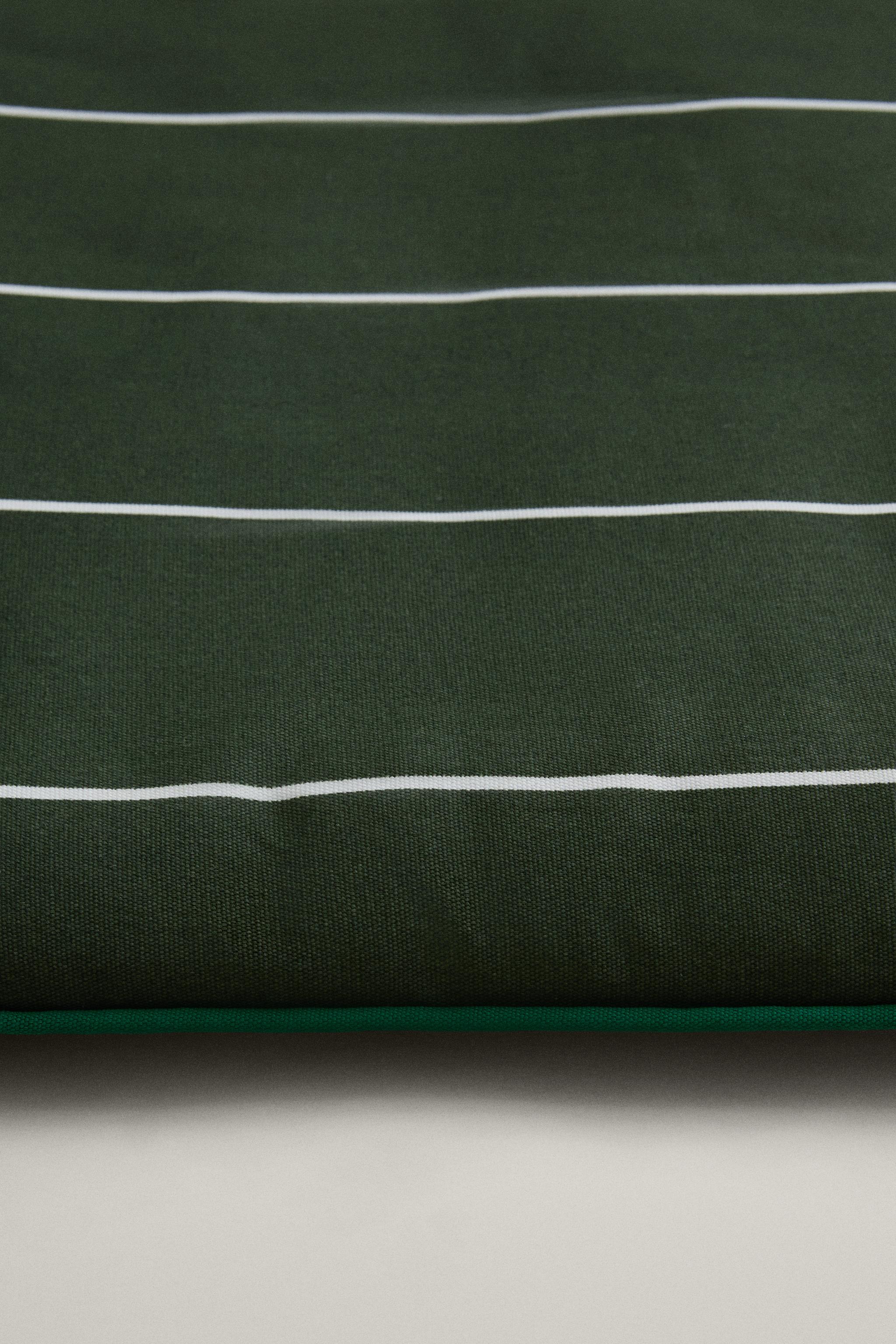 STRIPED TOPPER WITH PIPING