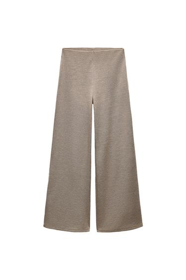 Front view of beige wide-leg trousers
