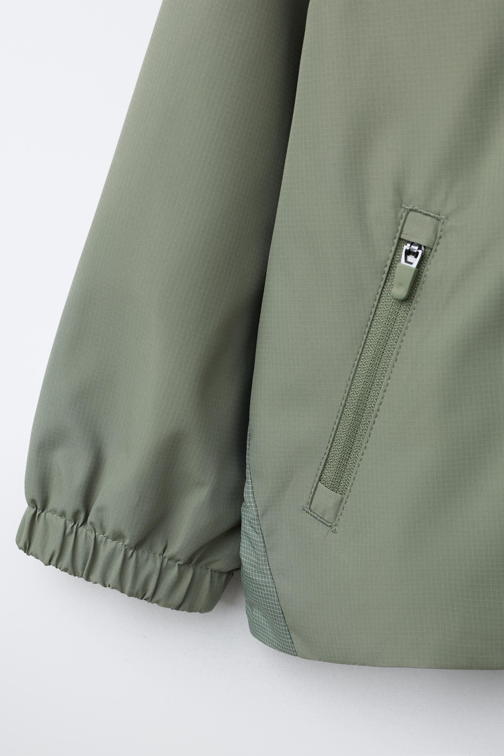 INTERLOCK WATER REPELLENT RAINCOAT