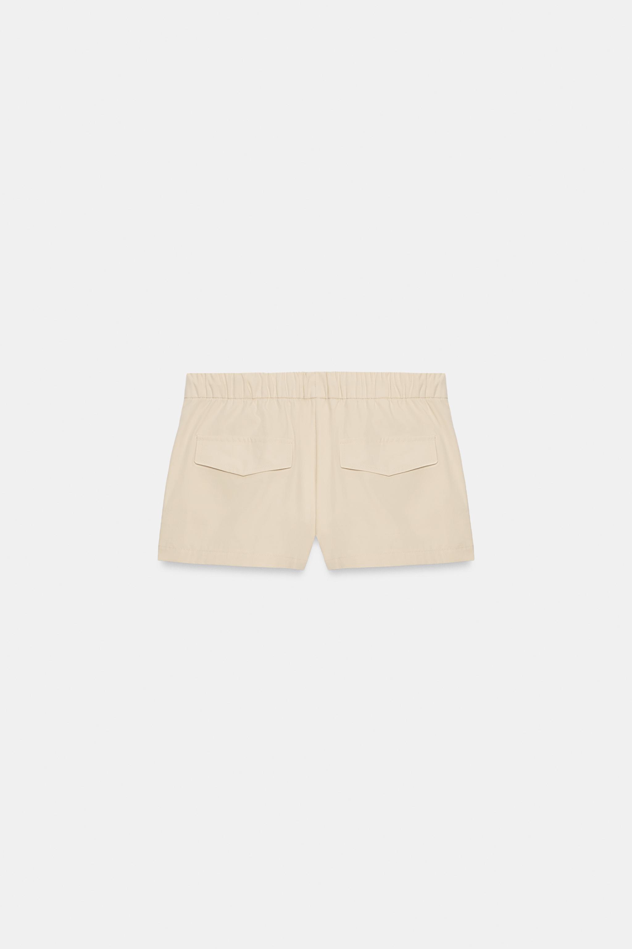 ELASTIC WAIST SHORTS WITH BUTTONS