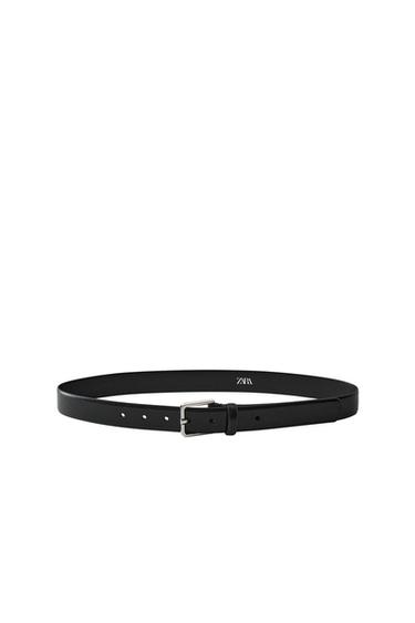 Front view of a black belt with a silver buckle and 'ZARA' text.