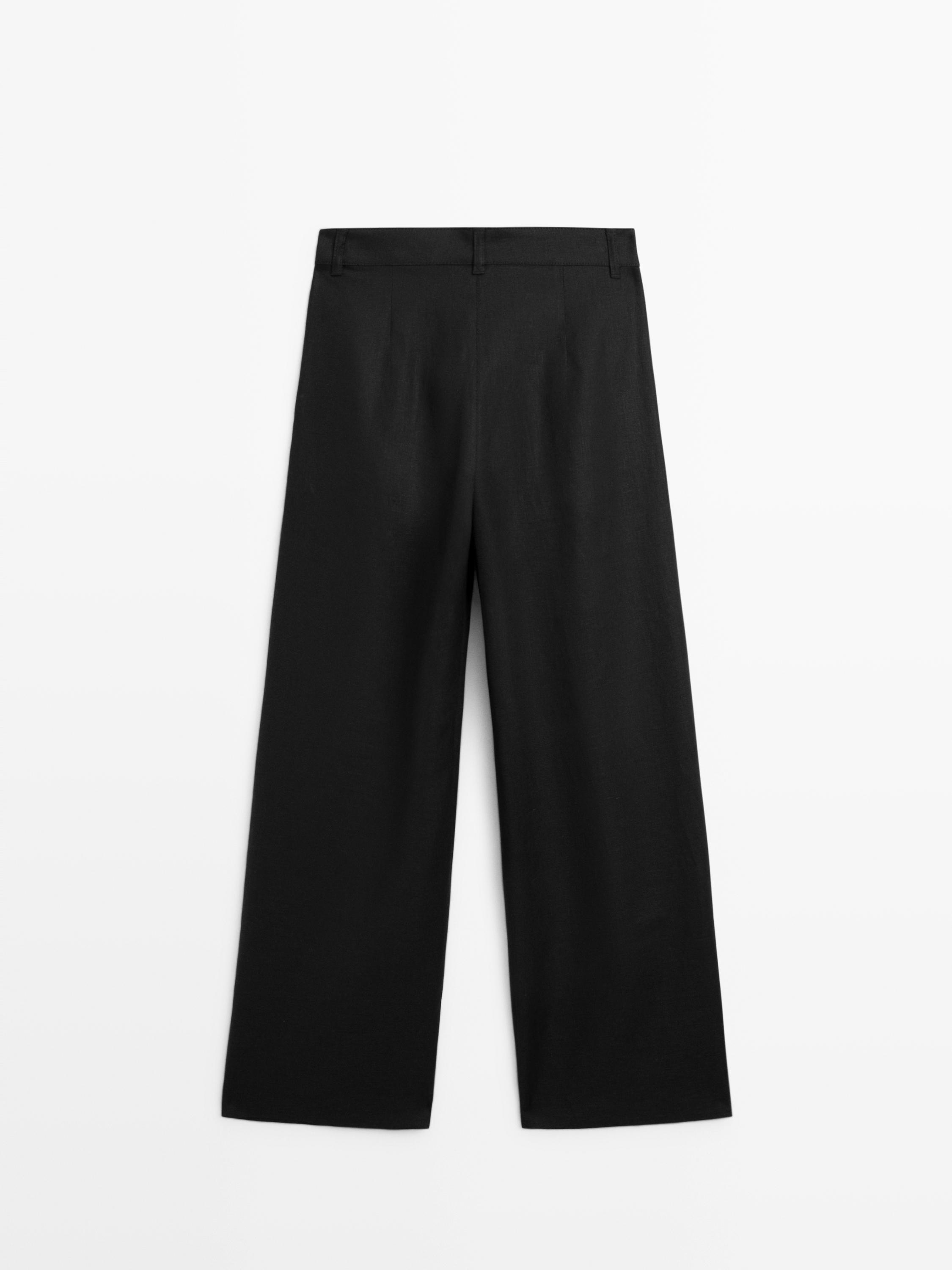 Wide-leg pleated linen trousers