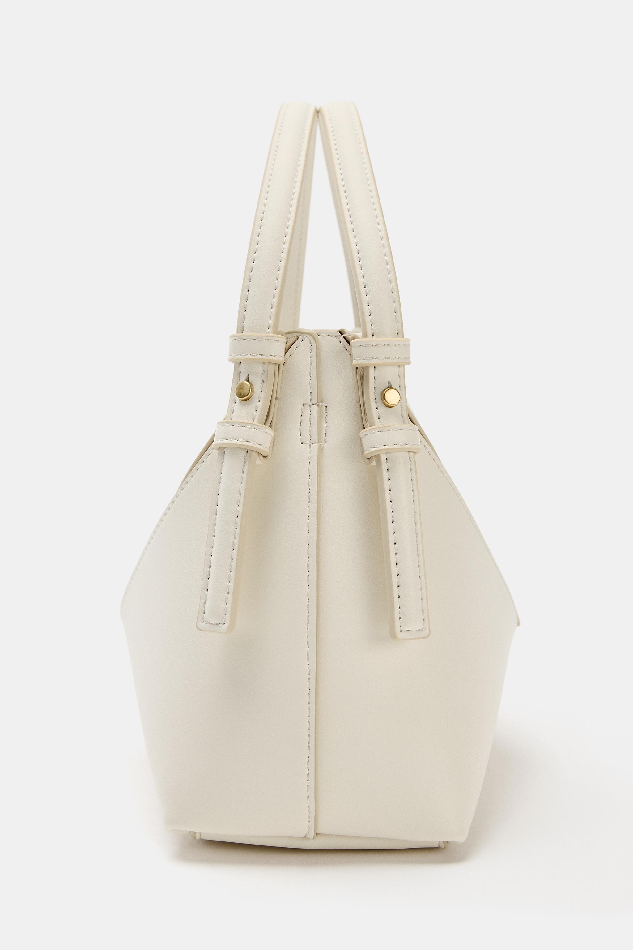 MINI SEAM DETAIL BUCKET BAG