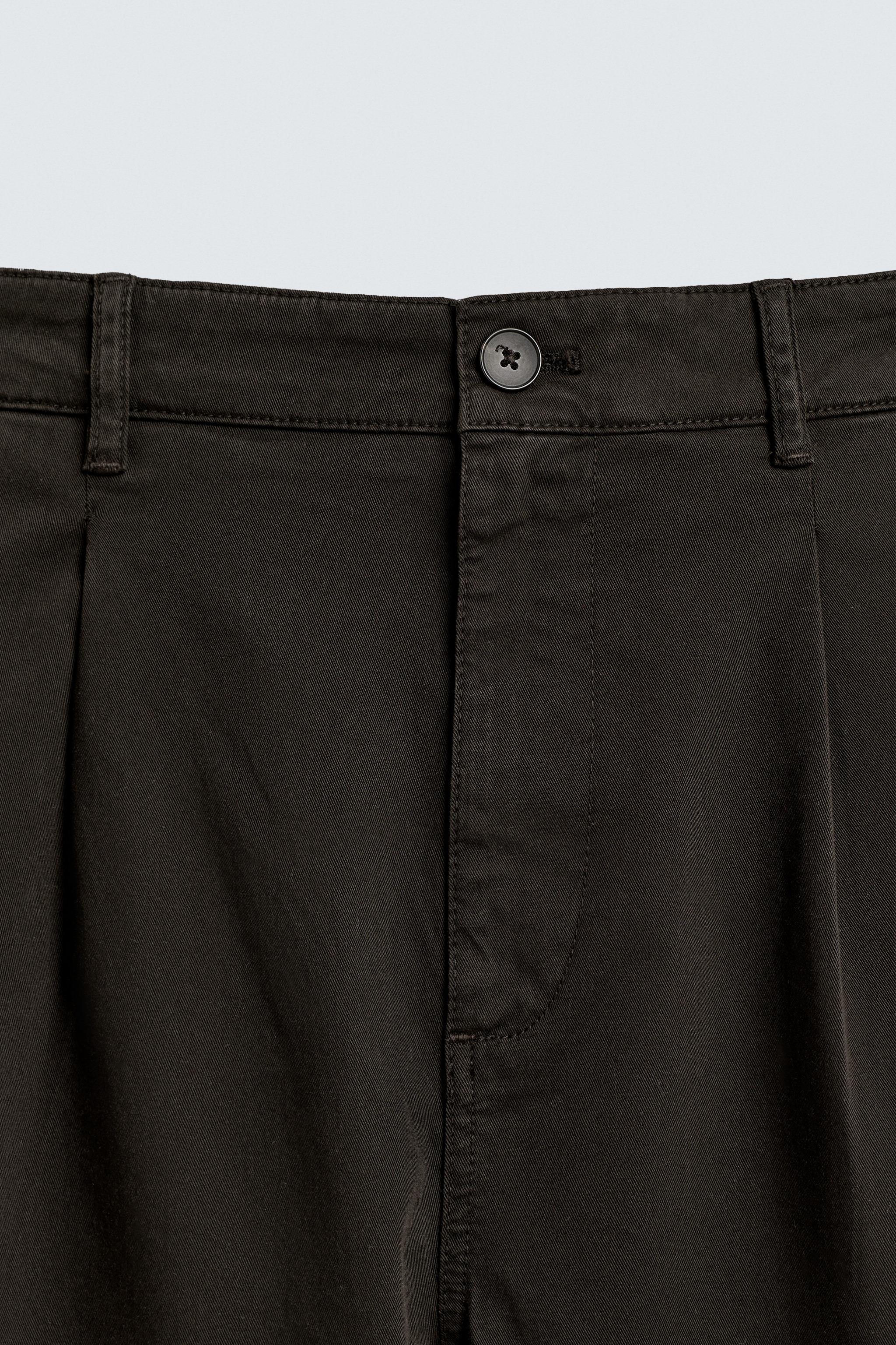 RELAXED FIT PLEATED PANTS