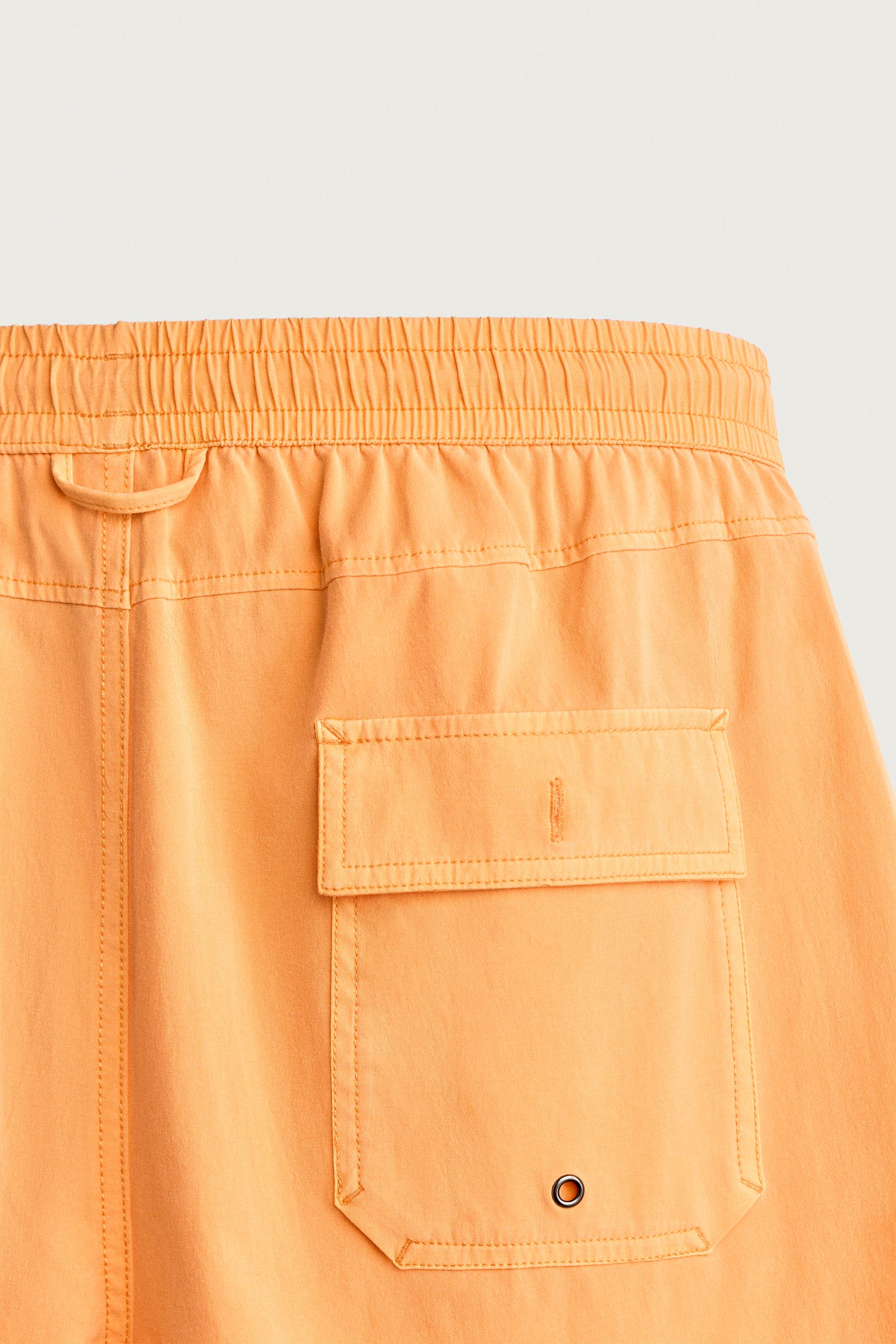 WASHED EFFECT LONG SWIM TRUNKS