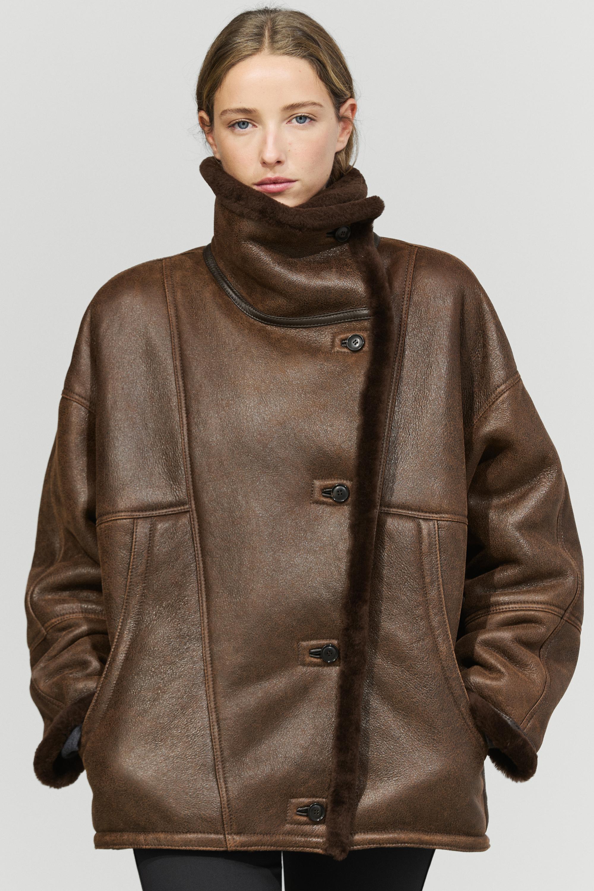 Manteau double face en cuir, daim et fourrure
