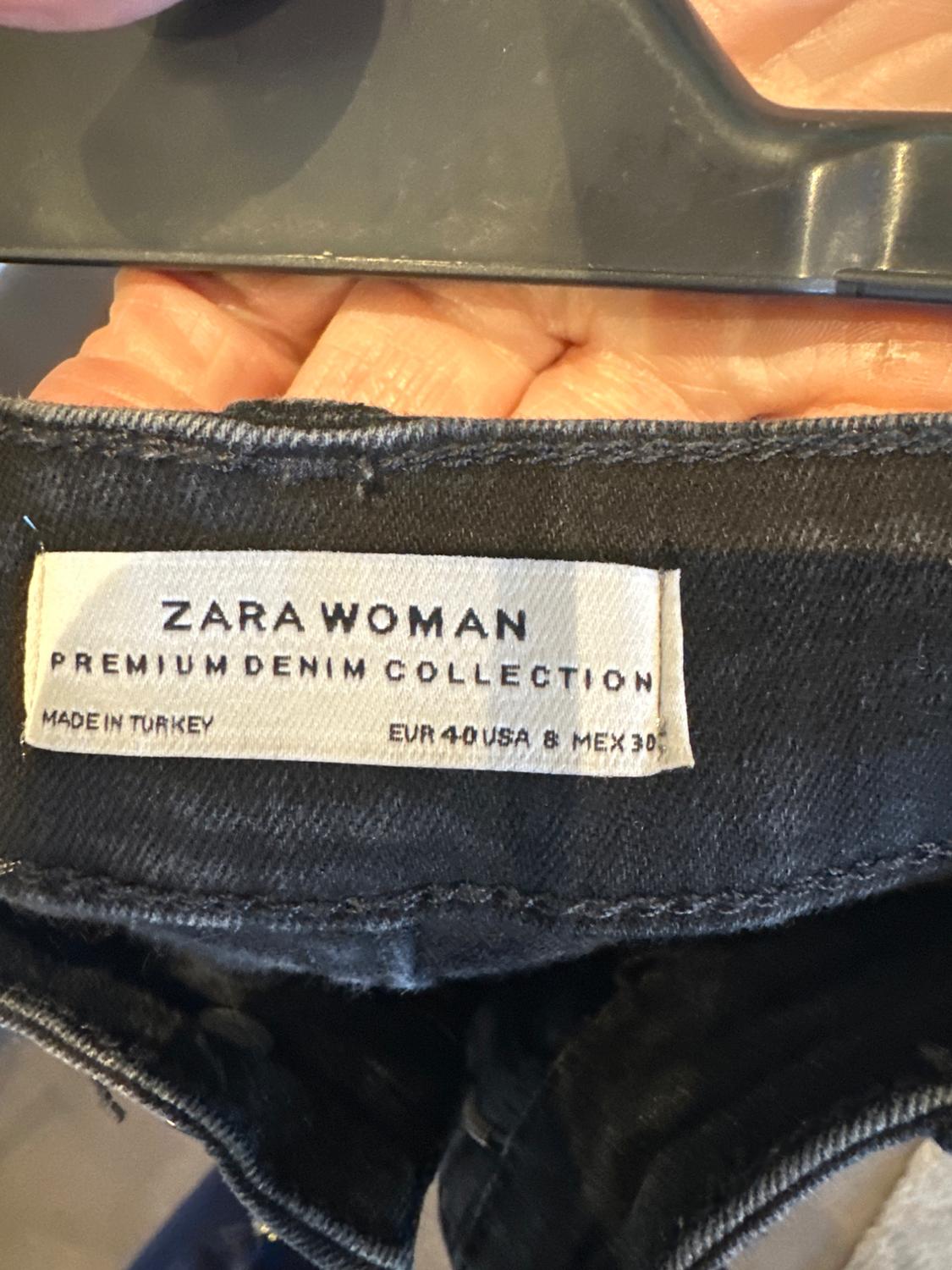 HIGH RISE JEANS WITH RIPS - Image 3