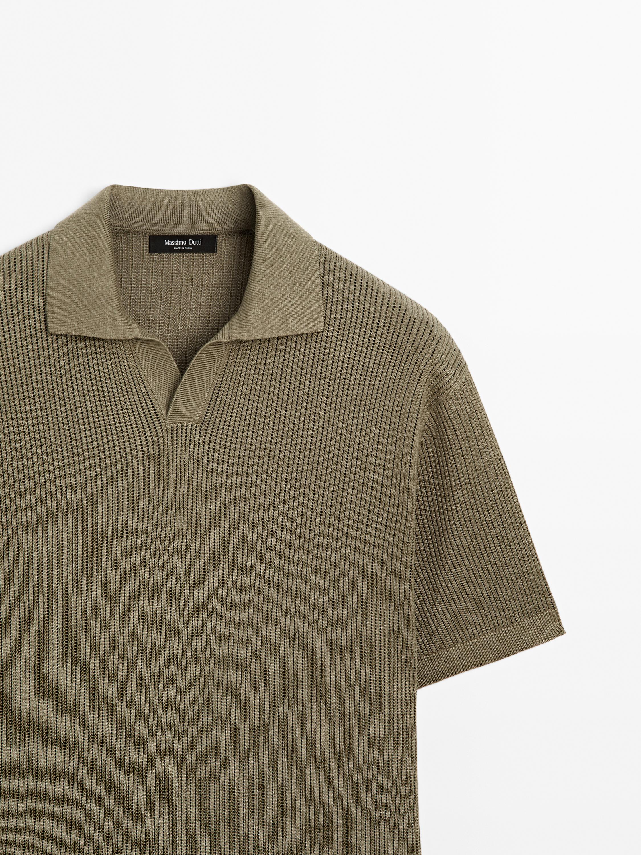 Polo en maille ajourée à col V