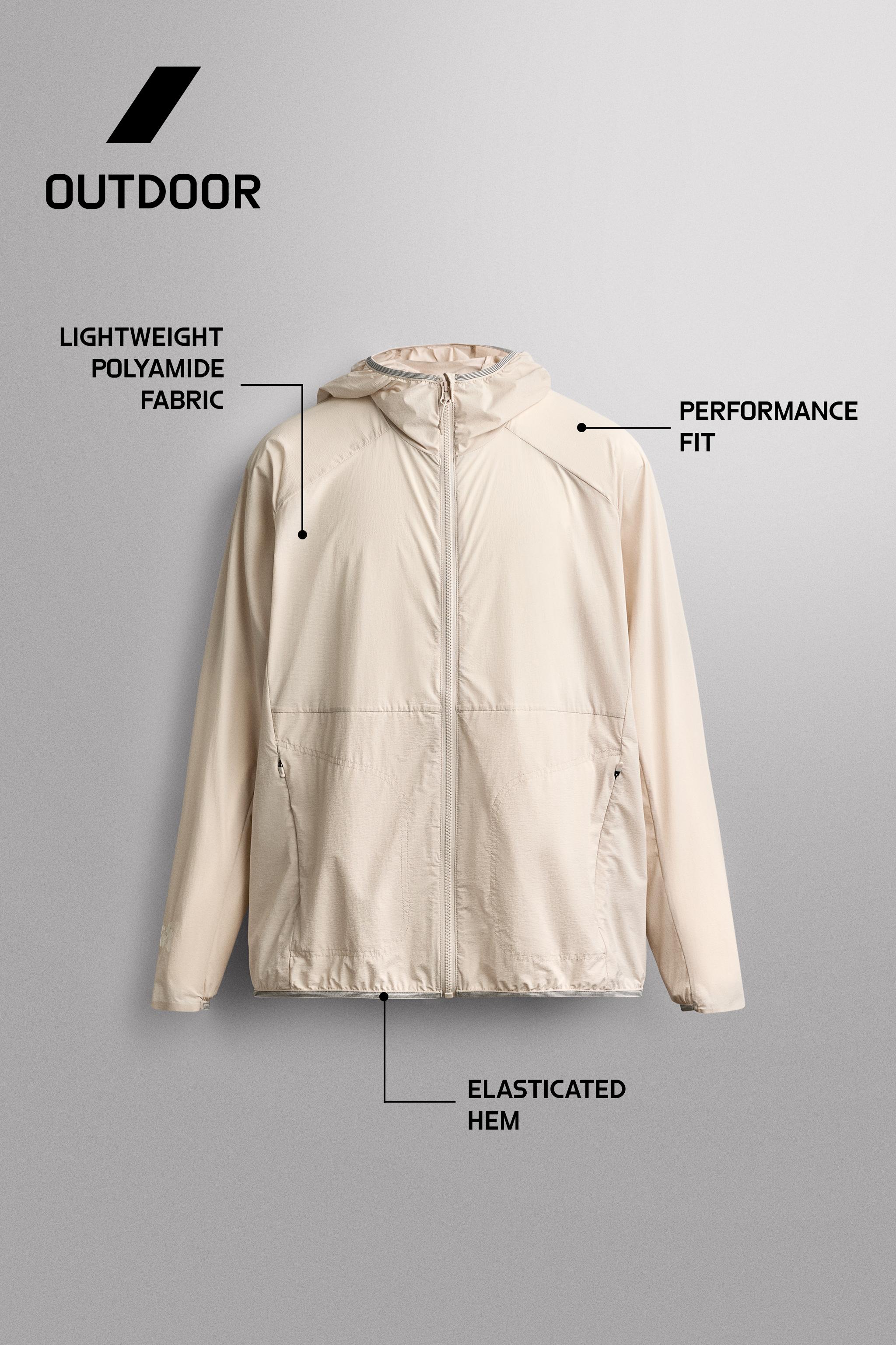 TECHNICAL WINDBREAKER JACKET