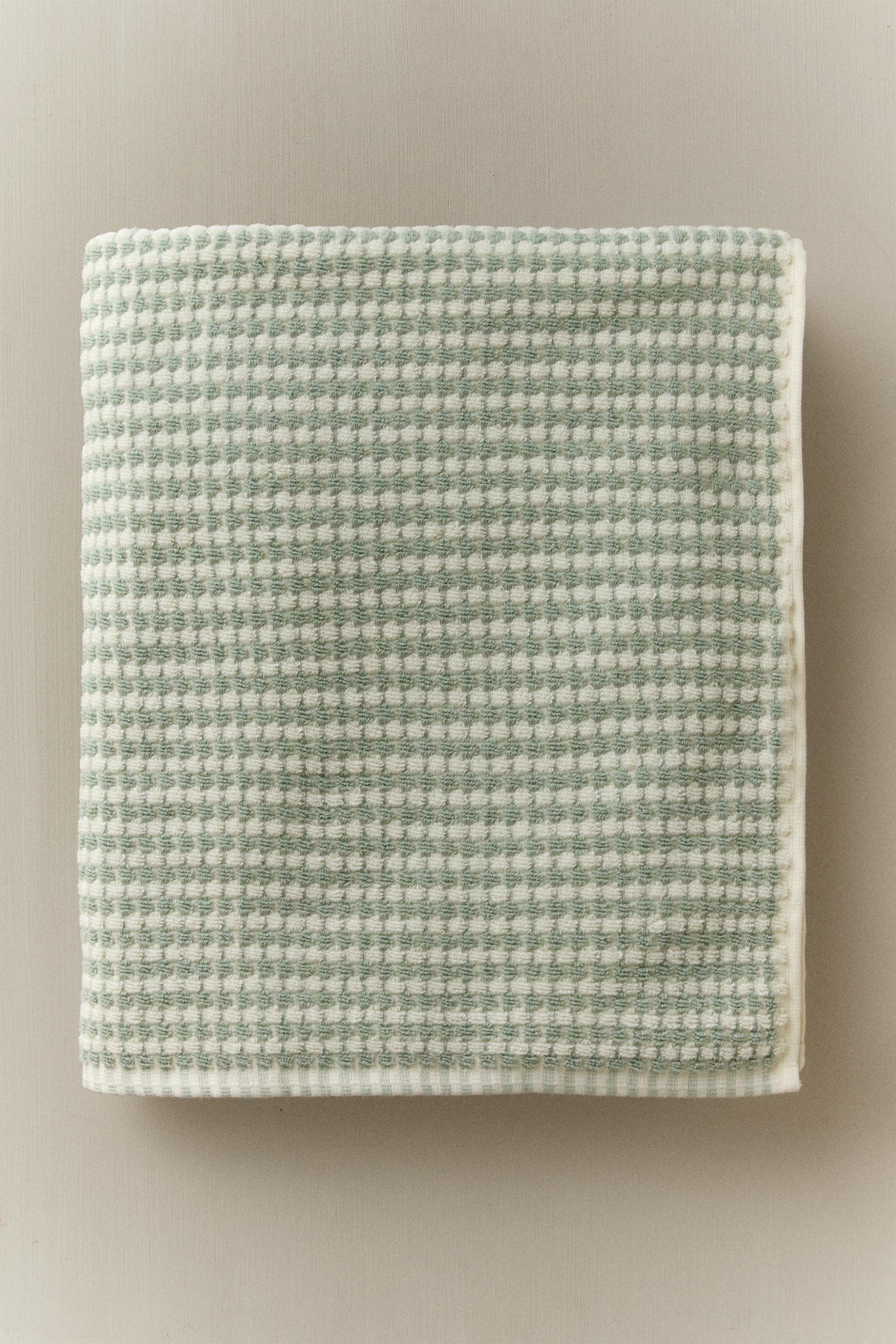 SERVIETTE DE BAIN EN COTON TEXTURÉ