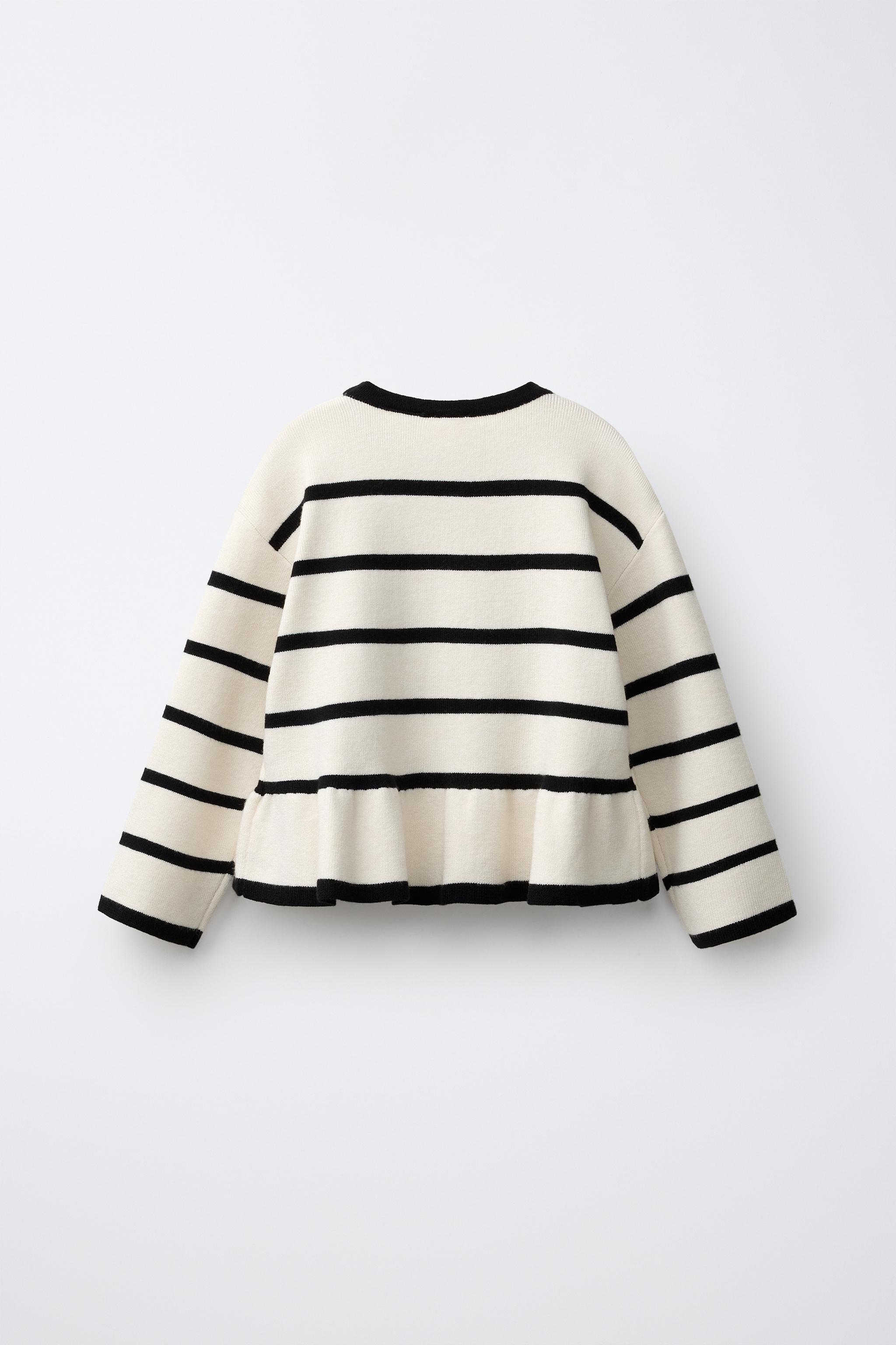 PULL EN MAILLE À RAYURES ET NŒUDS