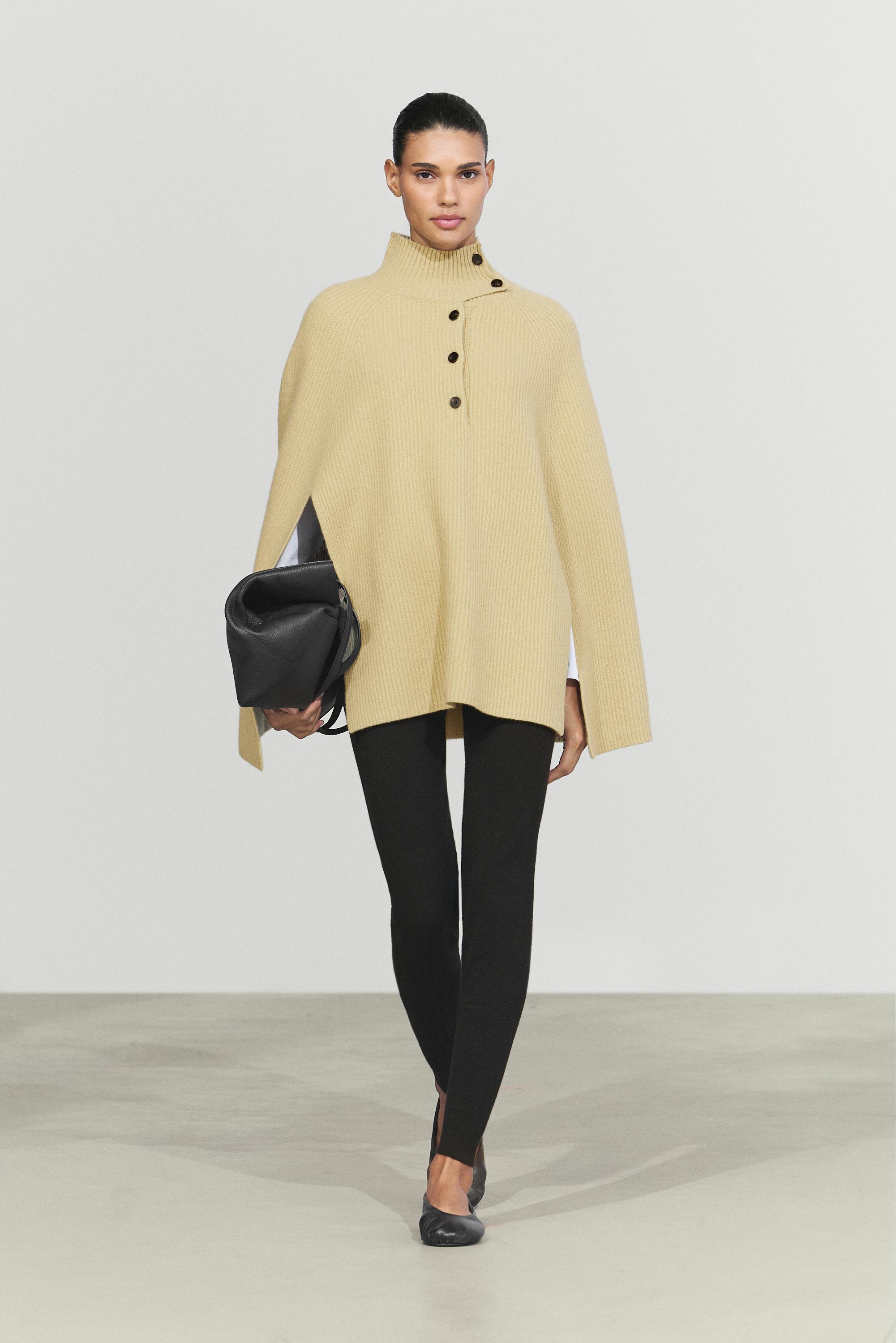 100% wool knit cape with button detail