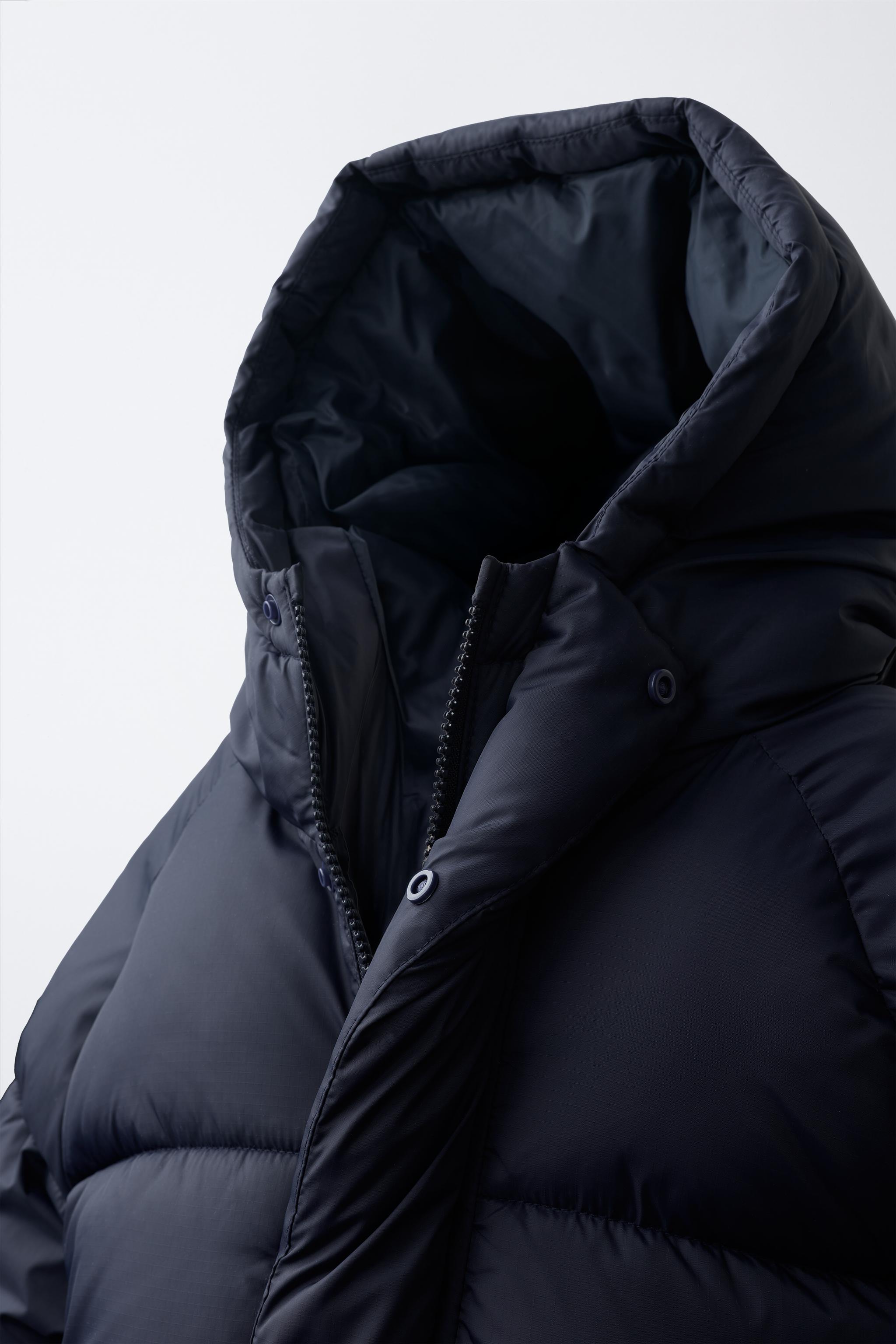 MANTEAU MATELASSÉ À CAPUCHE DÉPERLANT