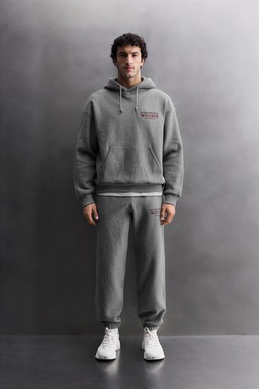 PRINTED TEXT JOGGING TROUSERS - Grey marl by Zara - Image 0